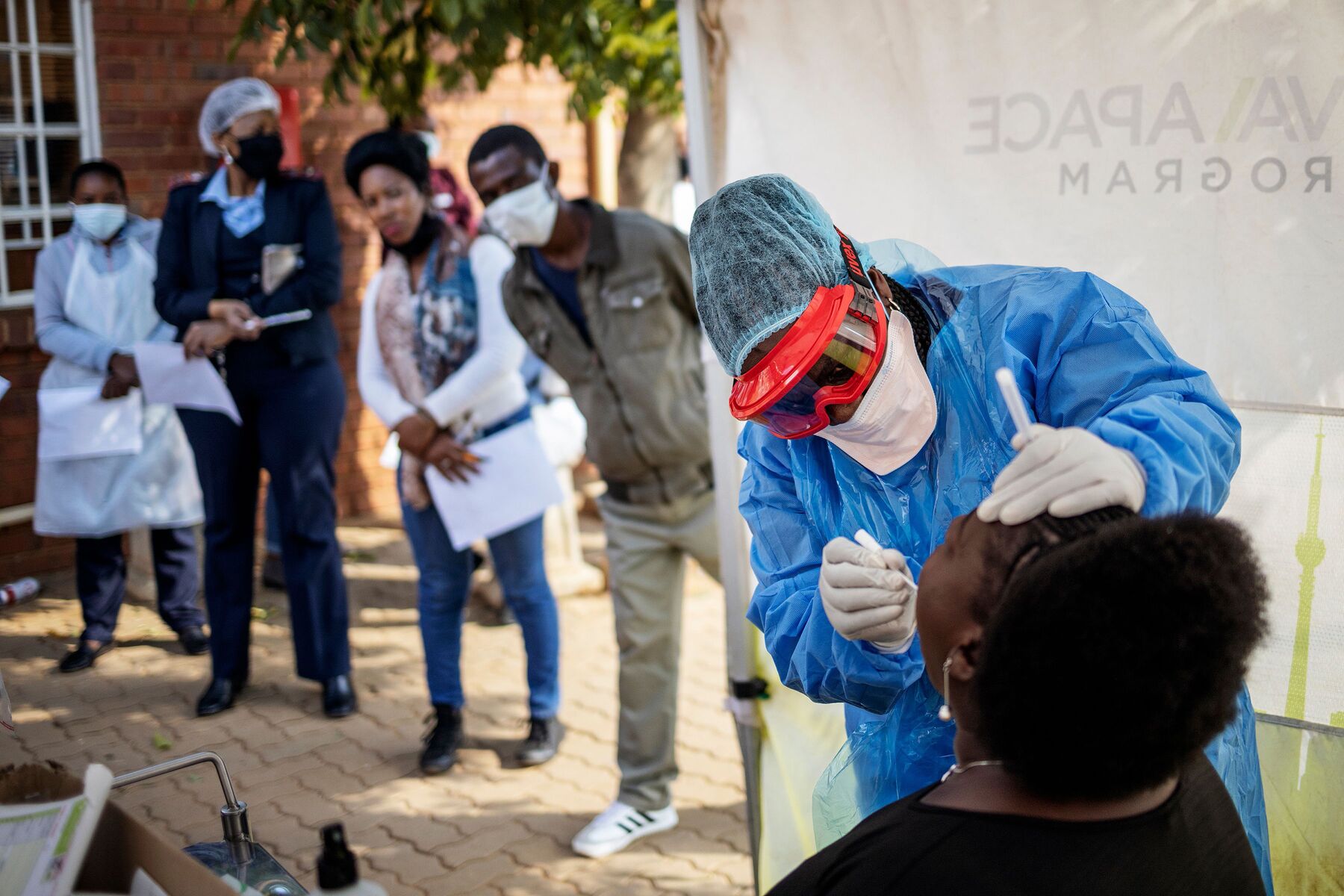 A nurse performs swab tests for Covid-19 in Johannesburg. 