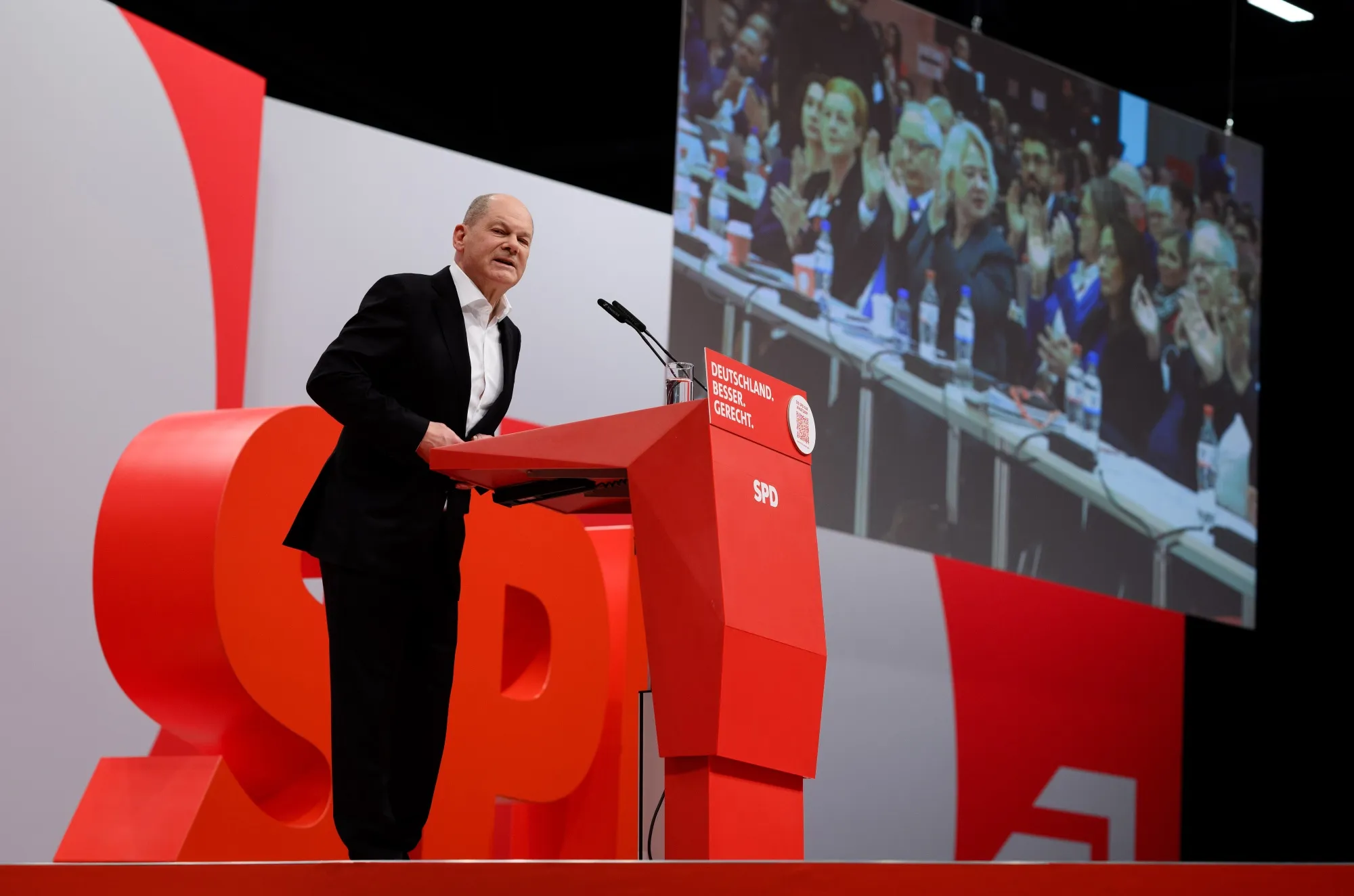 Olaf Scholz speaks at party conference, in Berlin on Dec. 9.