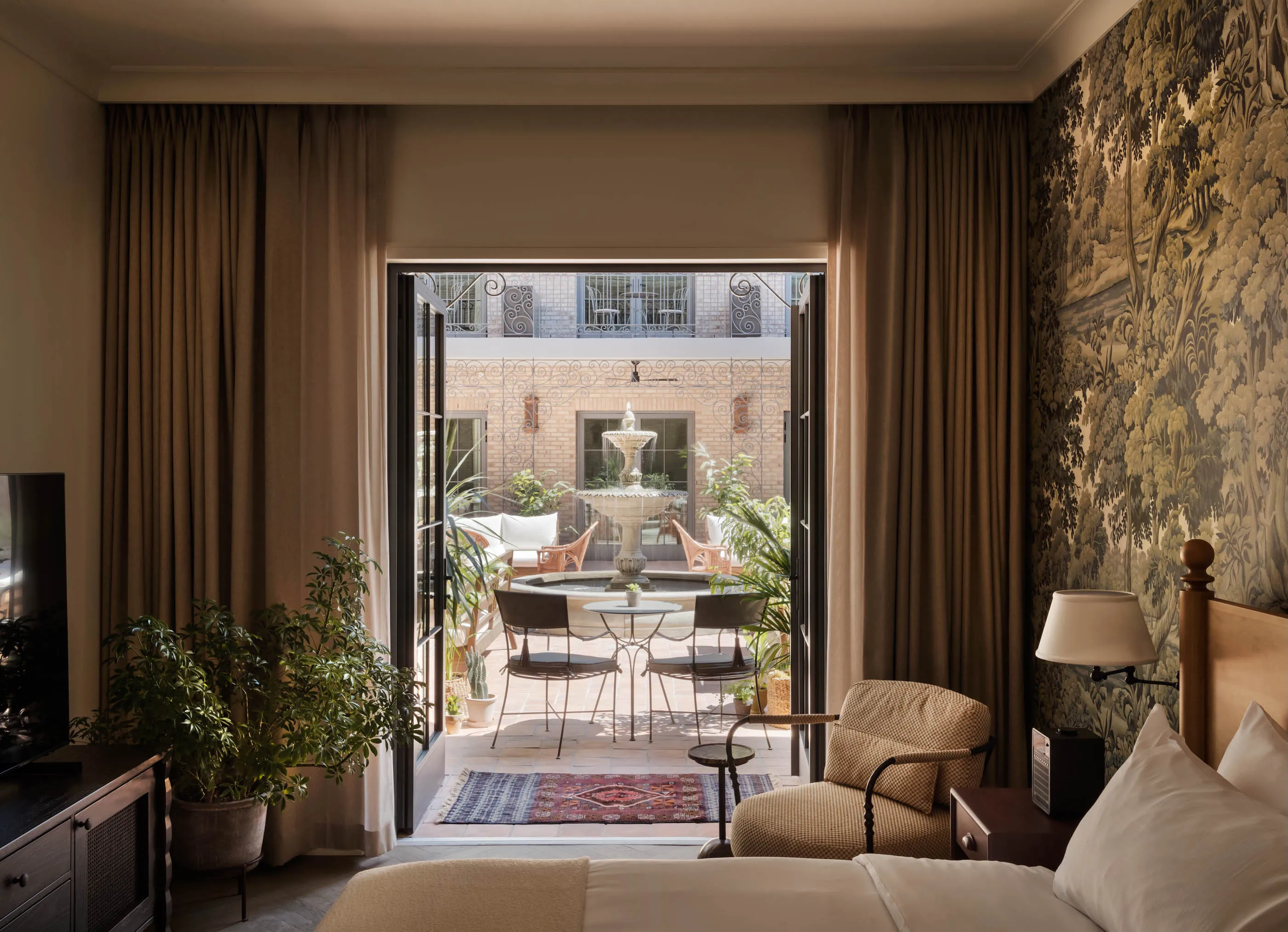 A courtyard-facing room at the Nickel hotel in Charleston.
