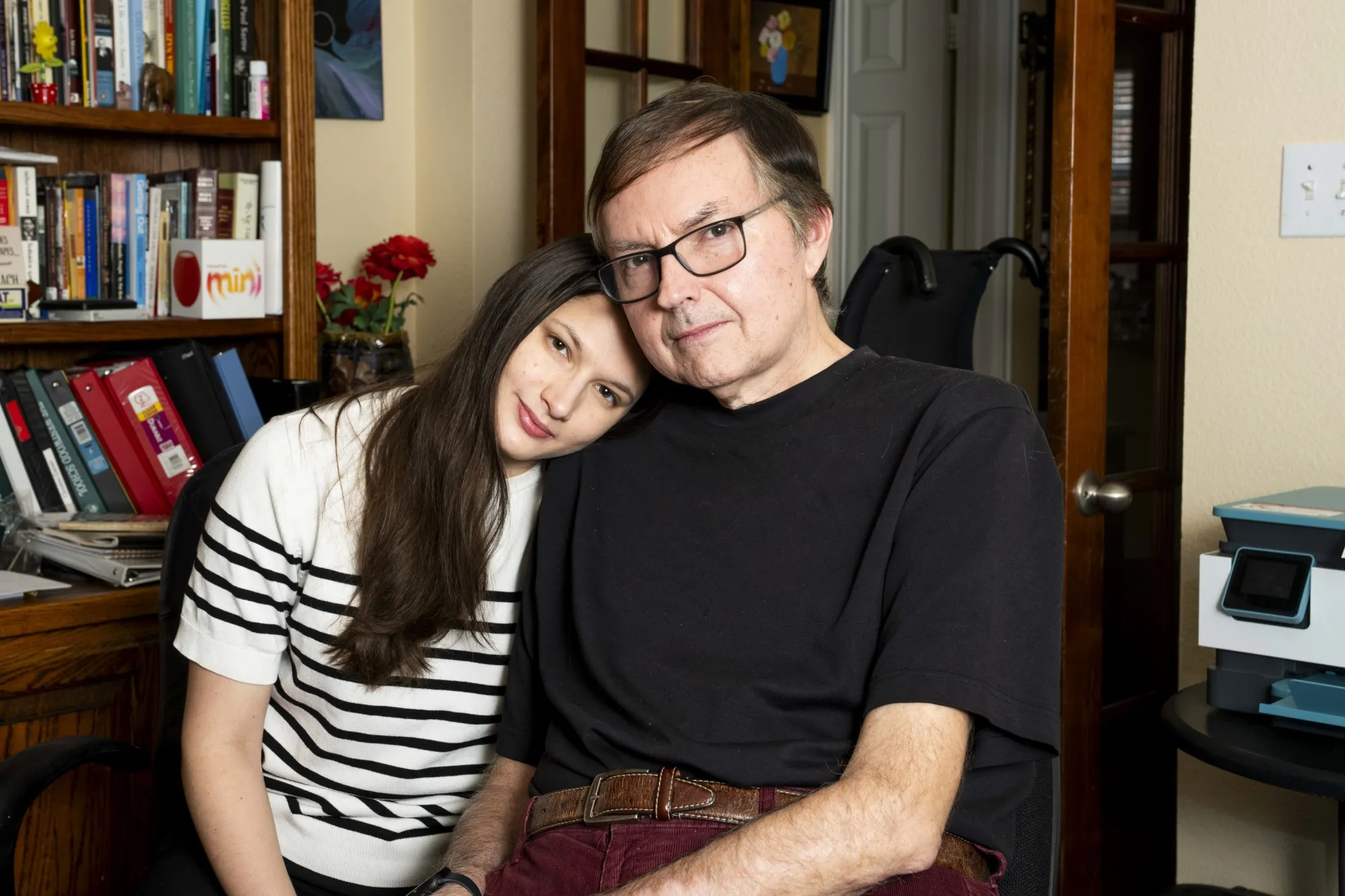 Ariadna Lubinus and her father, Manuel Lubinus, 61, at their home in Frisco, Texas
