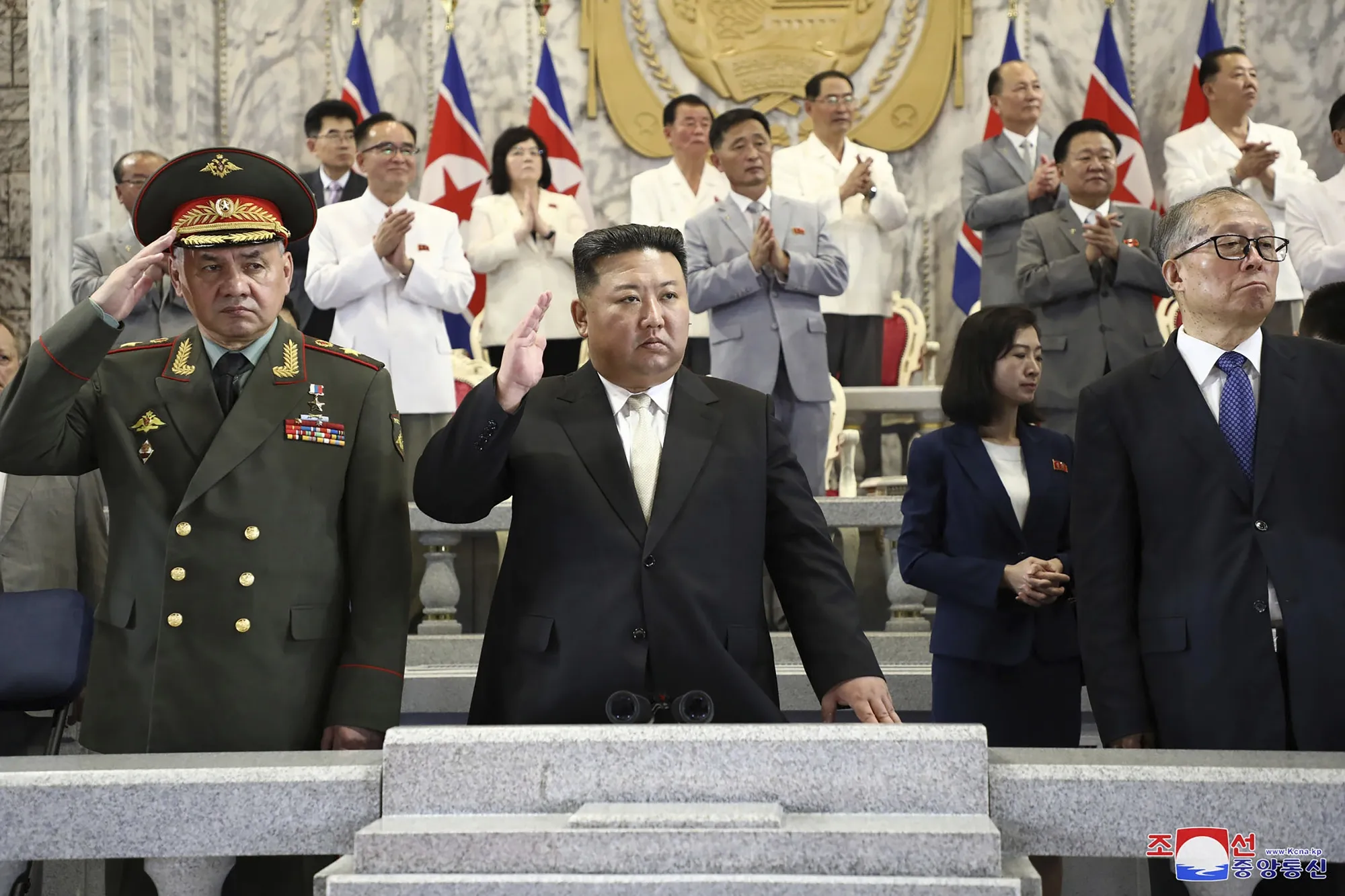 Kim Jong Un, center, with Sergei Shoiguand, left, and Li Hongzhong, in Pyongyang, North Korea, on July 27.