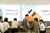 Customers look at products on display at a Huawei Technologies Co. store in Shenzhen, China, on Wednesday, May 22, 2019. Huawei is seeking about $1 billion from a small group of lenders, its first major funding test after getting hit with U.S. curbs that threaten to cut off access to critical suppliers.