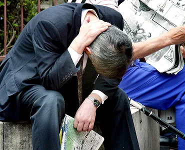 Recession Puts More Pressure on Japan's Workers