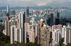 Residential and commercial buildings are seen from Victoria Peak in Hong Kong, China, on Monday, Sept. 11, 2017. Hong Kong stocks fluctuated on Sept. 12 as automakers extended gains driven by China\'s plan to phase out fossil-fuel vehicles, while banks and property companies weighed on the benchmark index.