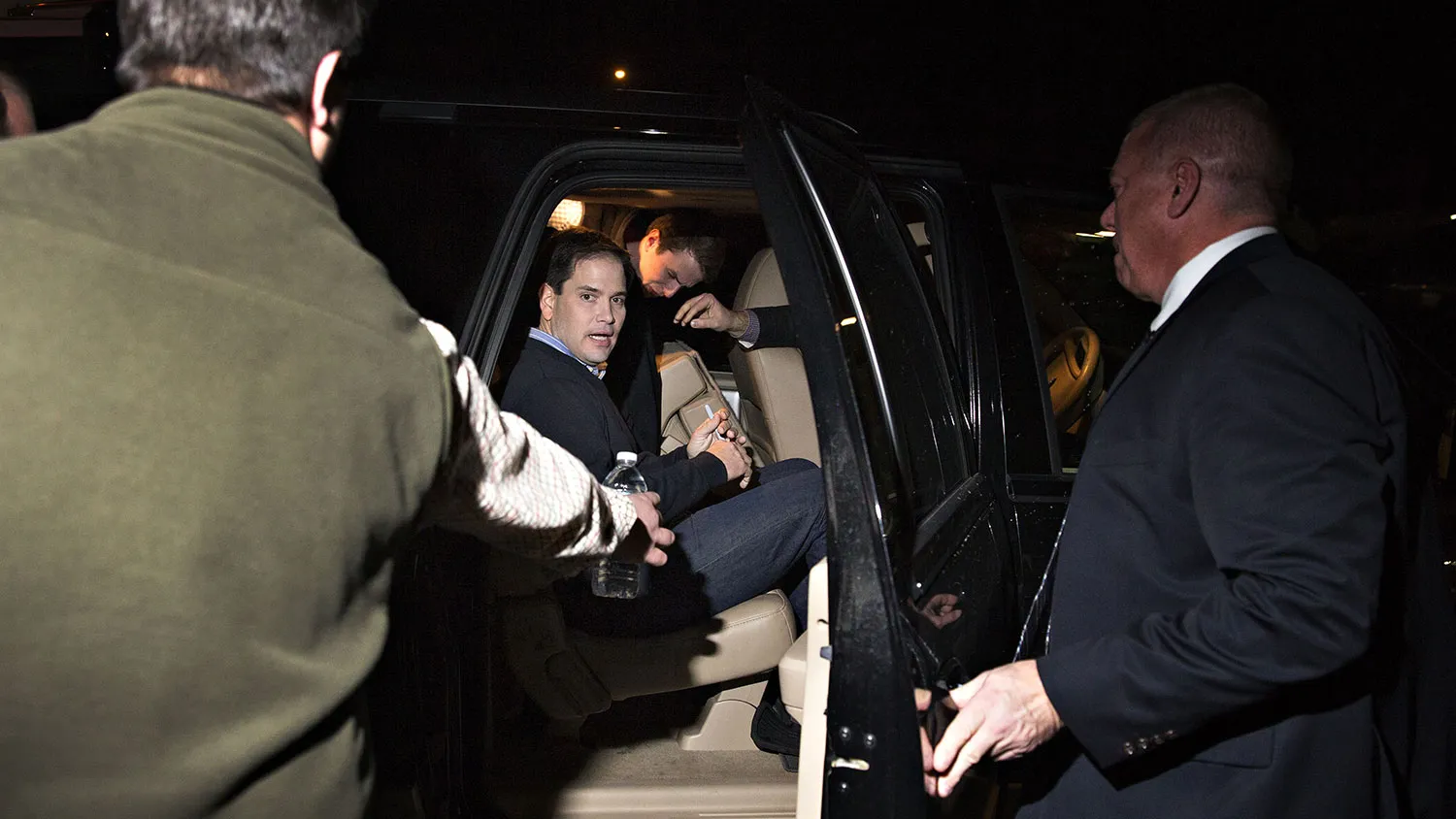 Senator Marco Rubio gets in his vehicle following an event at Wellman's Pub and Rooftop in West Des Moines, Iowa, on Jan. 27, 2016.
