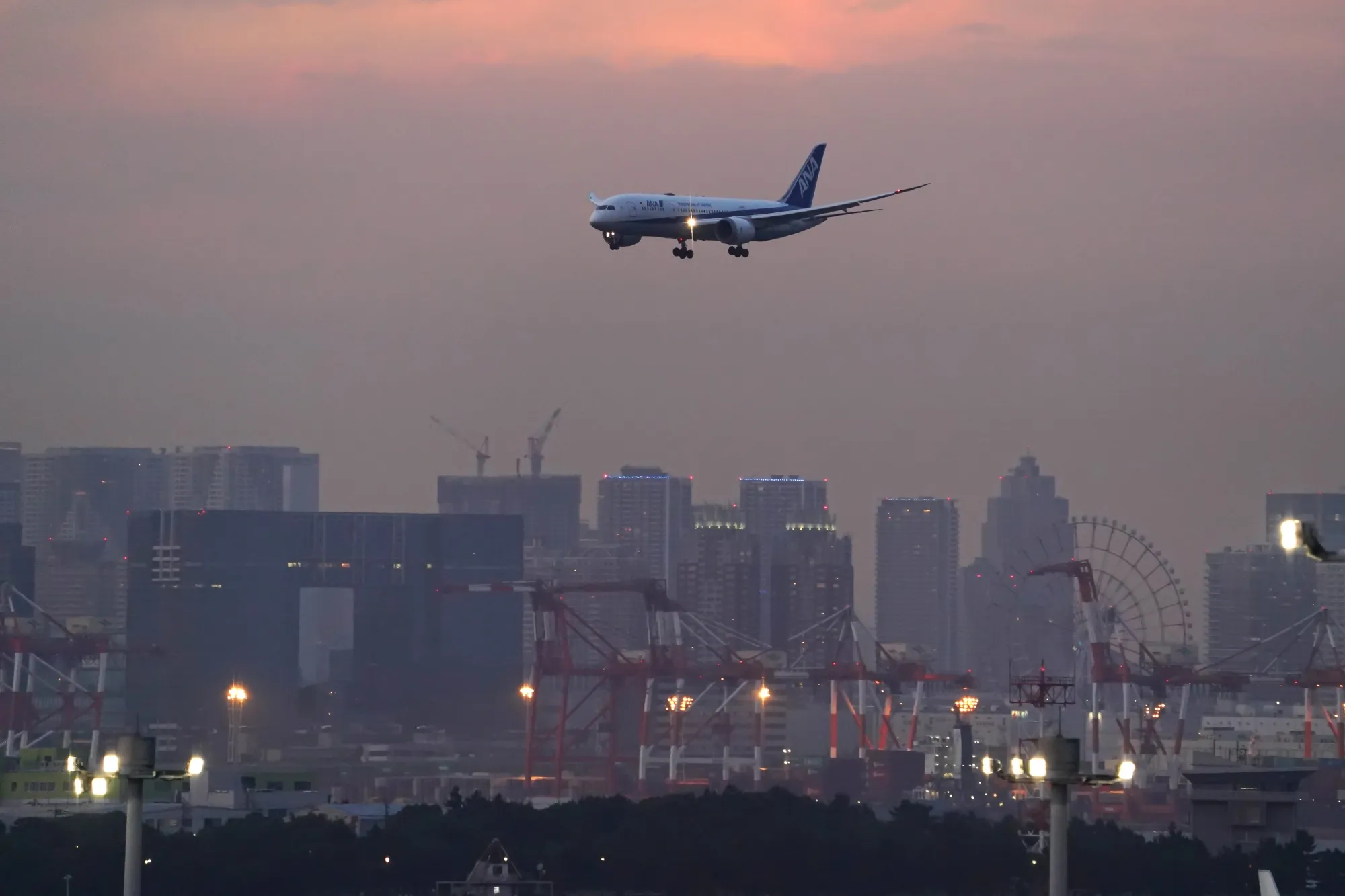 An aircraft operated by All Nippon Airways approaches Haneda Airport in Tokyo.