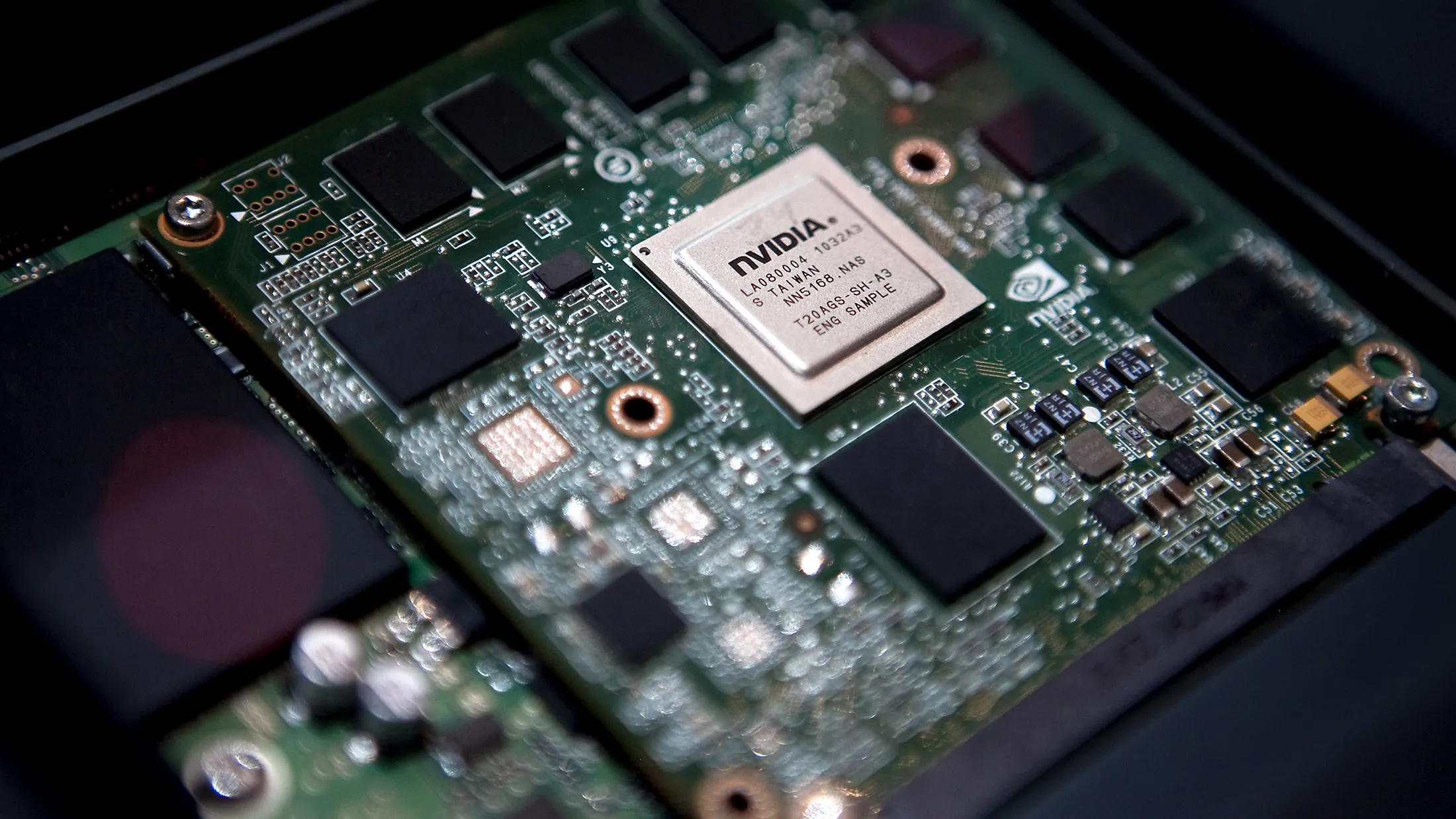 An Nvidia Corp. dual-core Tegra 2 chipset that will power the in-car multimedia systems of upcoming Audi AG vehicles sits on display at the 2011 International Consumer Electronics Show (CES) in Las Vegas, Nevada, U.S., on Thursday, Jan. 6, 2011. The 2011 CES tradeshow features 2,500 global technology companies presenting consumer tech products and is expected to draw over 100,000 attendees.
