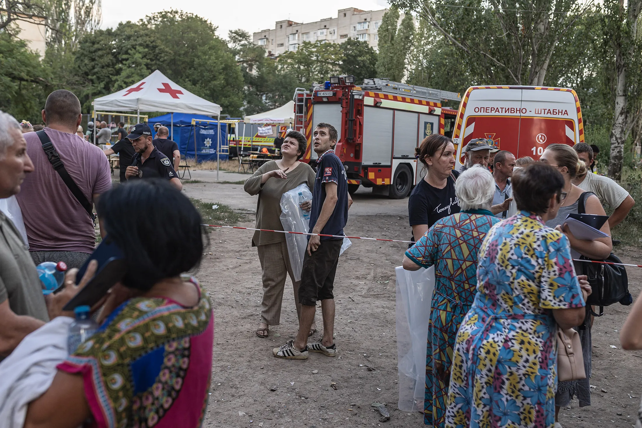 Residents observe&nbsp;damage to a building, after a Russian strike&nbsp;in&nbsp;Mykolaiv, Ukraine, on July 19.