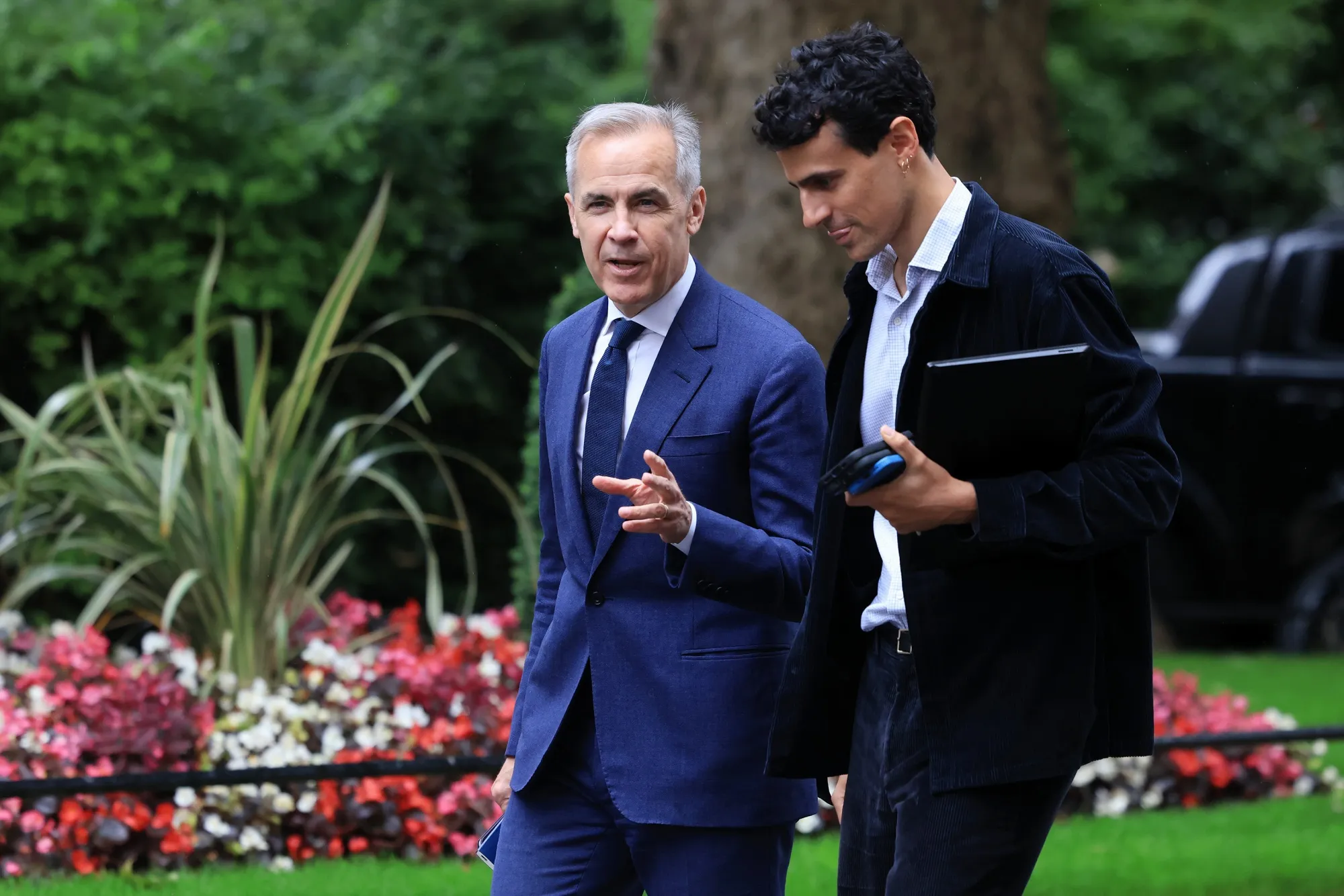 Mark Carney arrives at 11 Downing Street in London in&nbsp;2024.