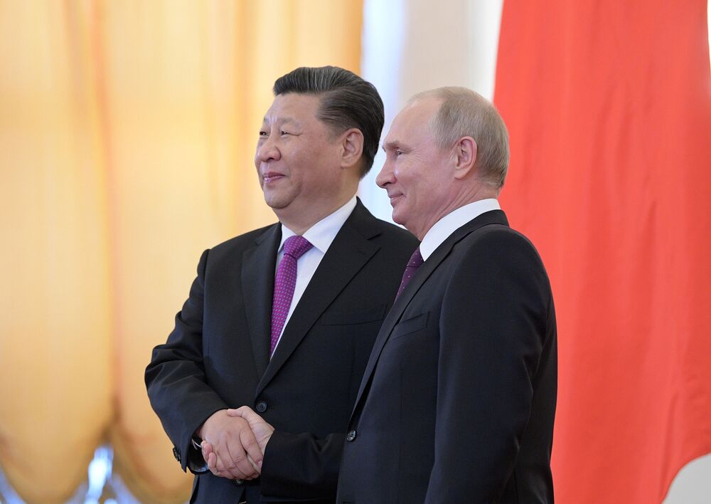 習主席 プーチン大統領との関係深化を称賛 米との緊張と対照的 Bloomberg