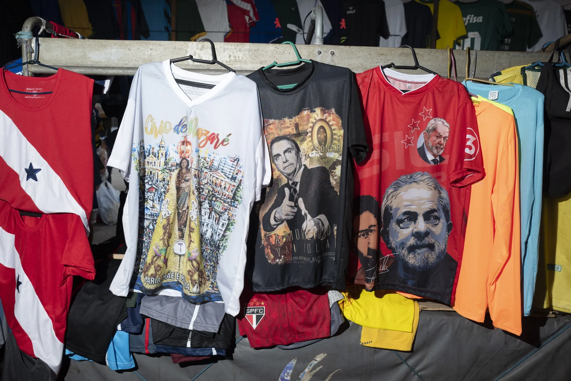 T-shirts supporting Jair Bolsonaro and Luiz Inacio Lula da Silva displayed for sale&nbsp;during Brazil’s largest religious festivals, Cirio de Nazare, in Belem on Oct. 8.