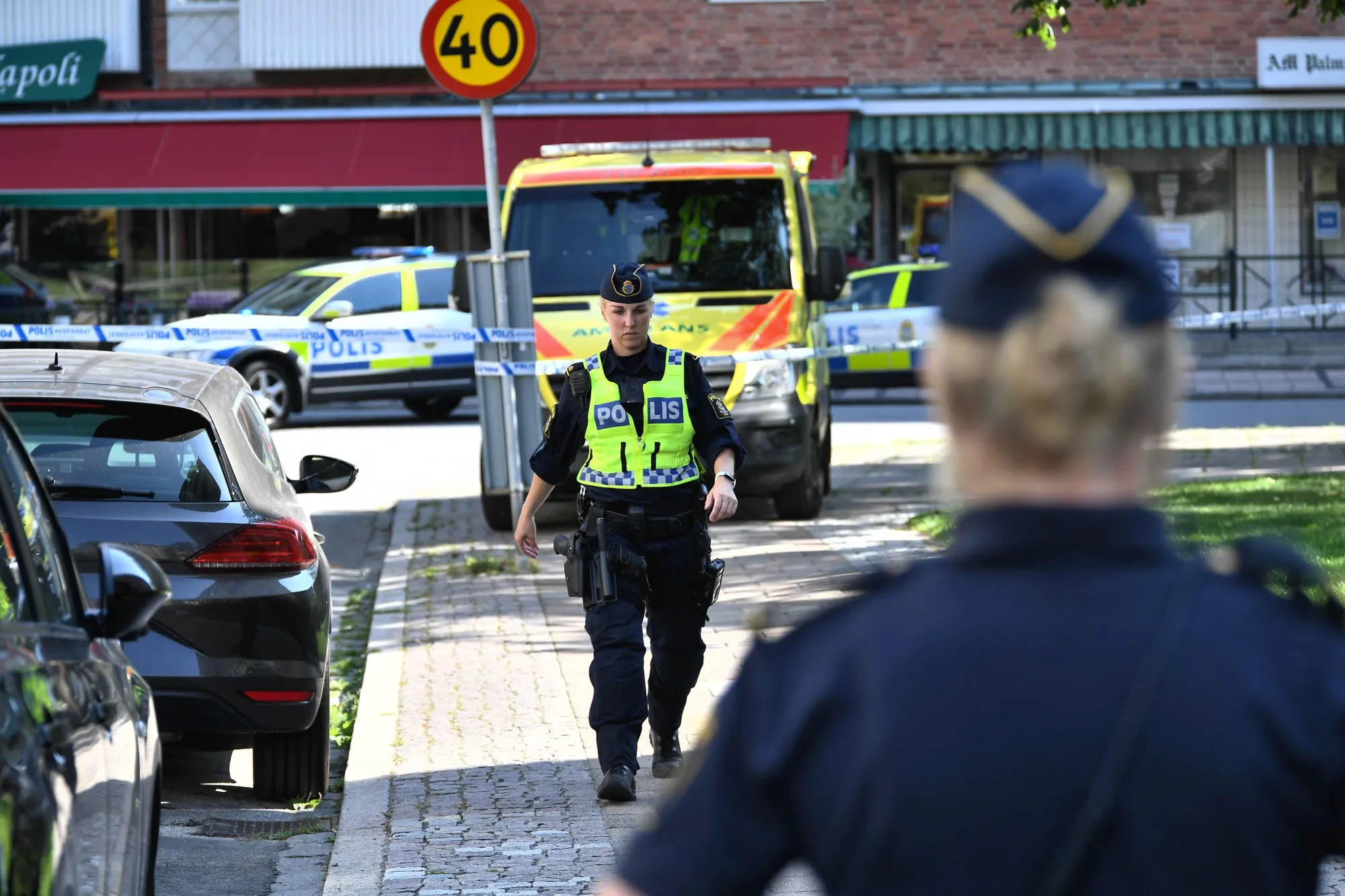 Police cordon off the scene where a woman was shot dead in Malmo, Sweden on Aug, 26.