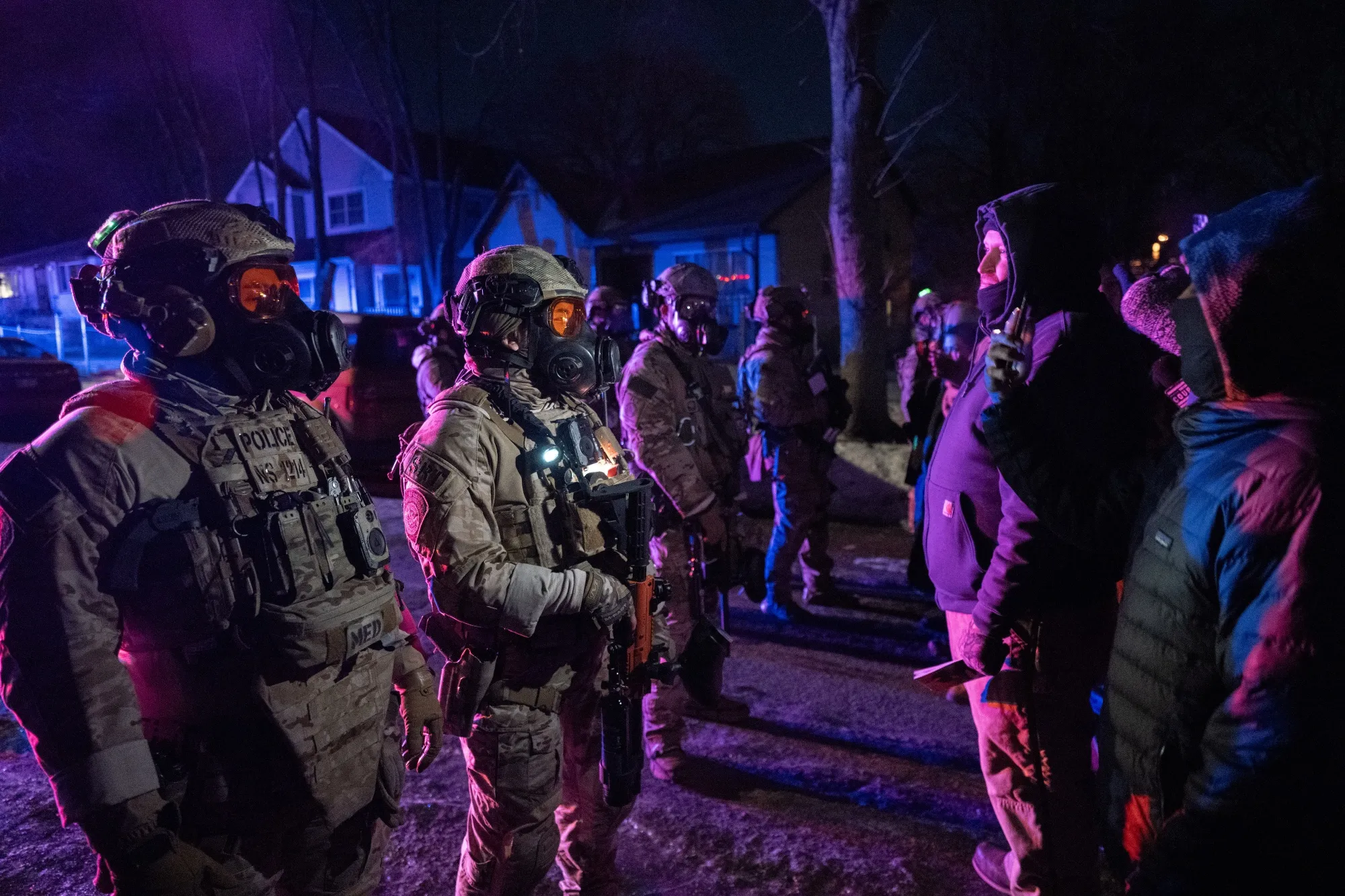Federal law enforcement officers during confrontations with residents following a shooting incident in Minneapolis on&nbsp;Jan. 15.