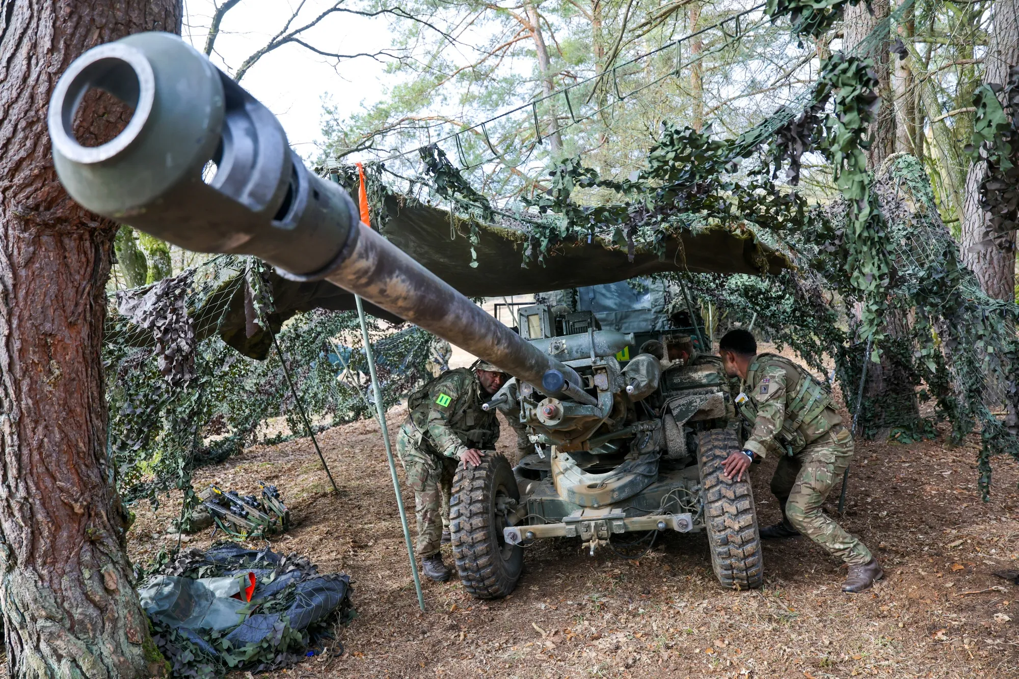 UK soldiers maneuver an anti-aircraft gun during the 'Allied Spirit25' US military and NATO training exercise in Hohenfels, Germany, on&nbsp;March 12.