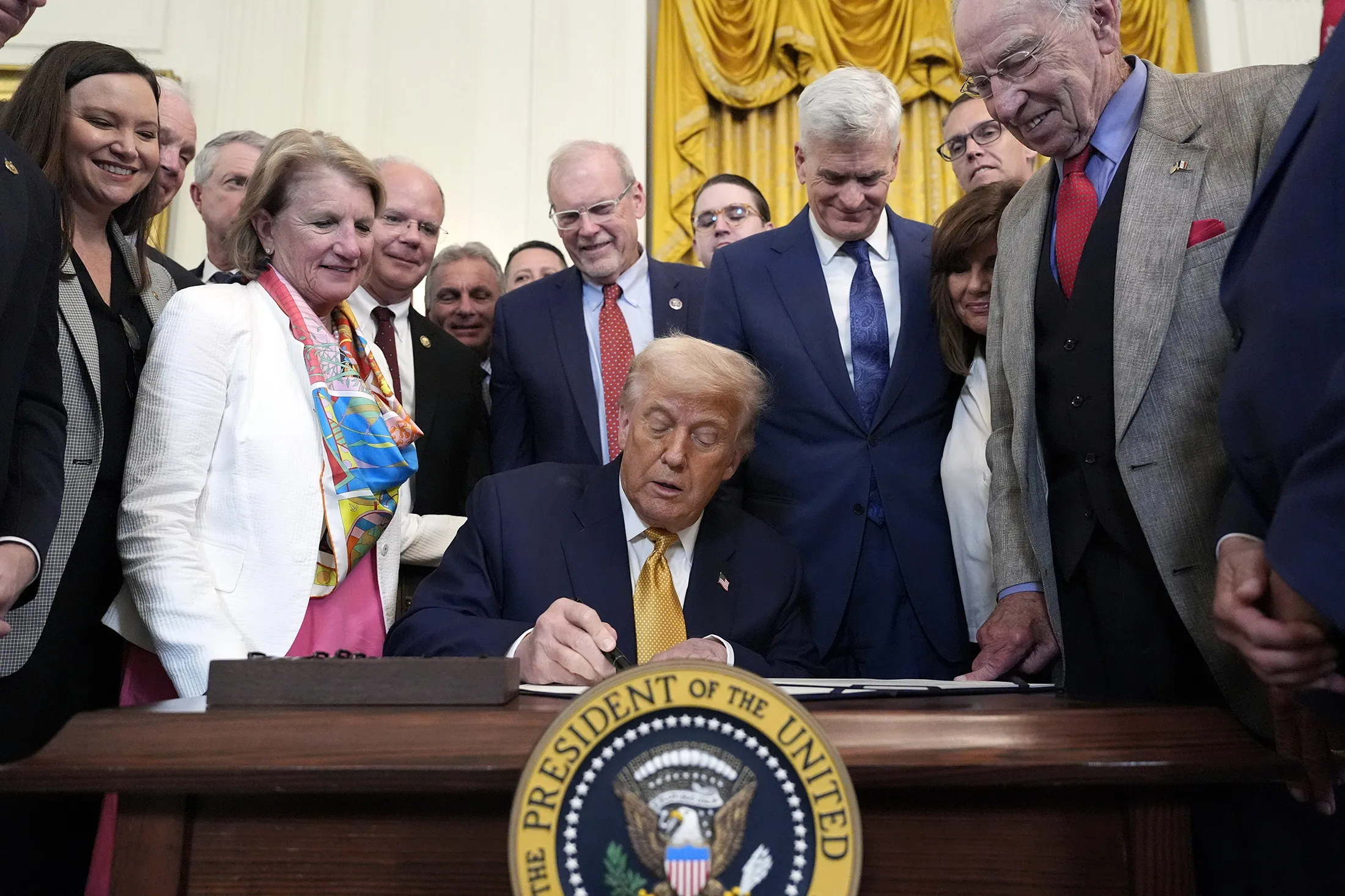 President Donald Trump signs the "Halt All Lethal Trafficking of Fentanyl Act," during a ceremony at&nbsp;the White House on July 16.