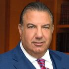 Headshot of John S Koudounis