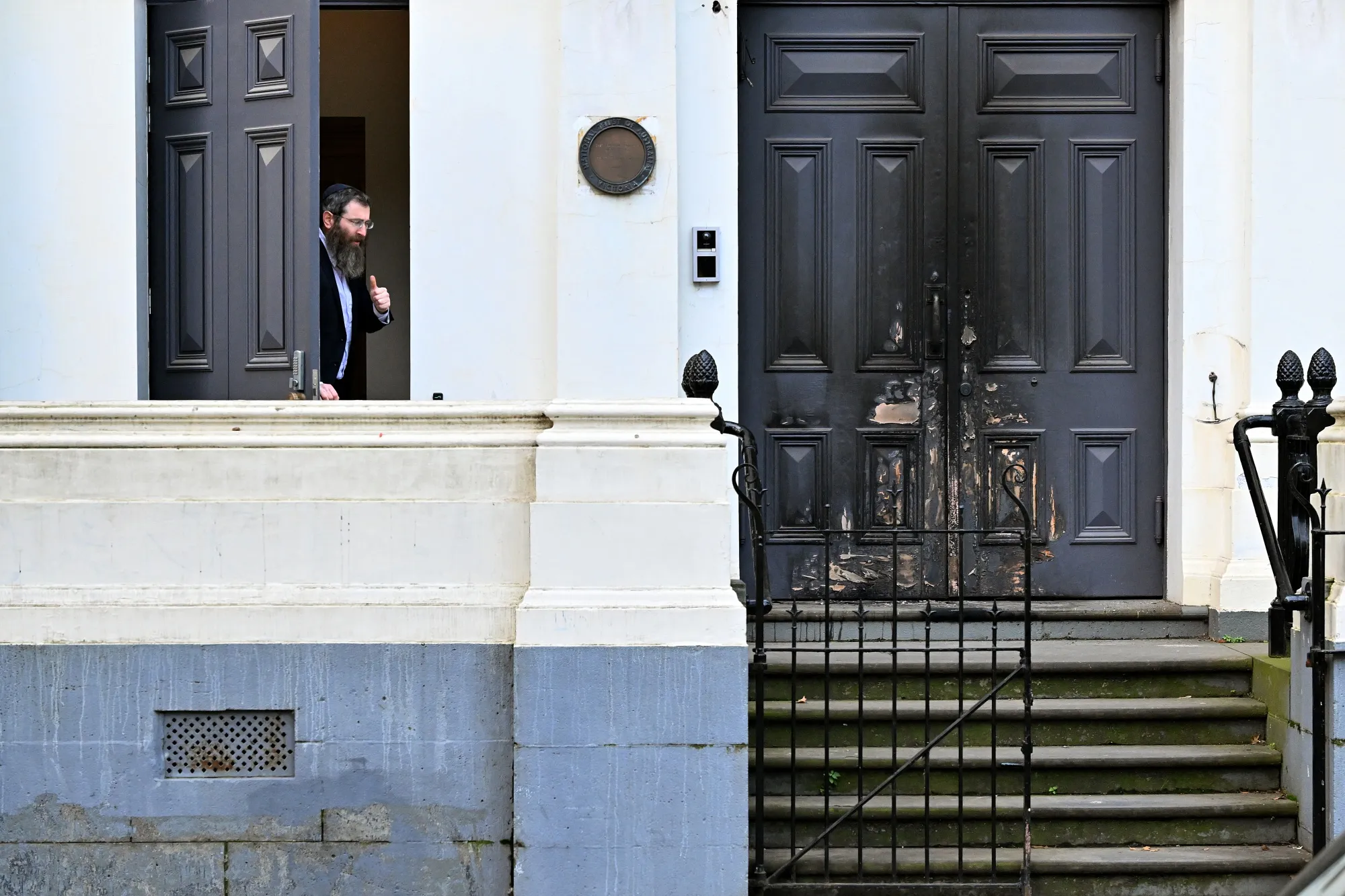 The burnt entrance of the East Melbourne Synagogue in Melbourne on July 6.