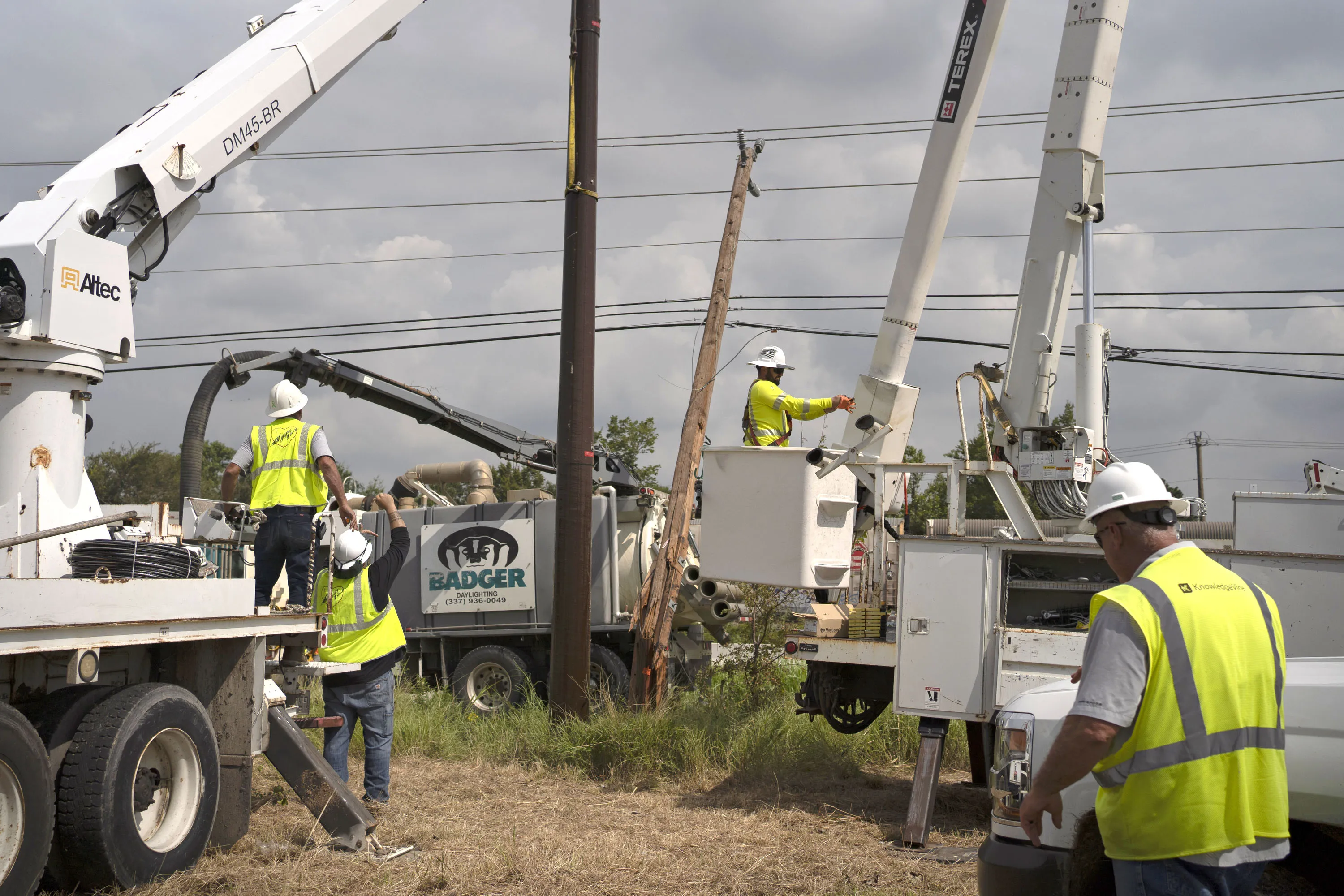 CenterPoint assistance crews work to restore power lines in Houston, Texas on July 11.
