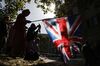 Pro-Brexit demonstrators wave the Union flag and hold placards outside the Supreme Court in central London, on the second day of the hearing into the decision by the government to prorogue parliament on September 18, 2019. - Judges are hearing three days of highly-charged arguments over whether it was lawful for Britain's Prime Minister Boris Johnson to advise Queen Elizabeth II to prorogue, or suspend, parliament for more than a month, as the clock ticks down to Britain's October 31 EU exit date. (Photo by Tolga AKMEN / AFP) (Photo credit should read TOLGA AKMEN/AFP/Getty Images)