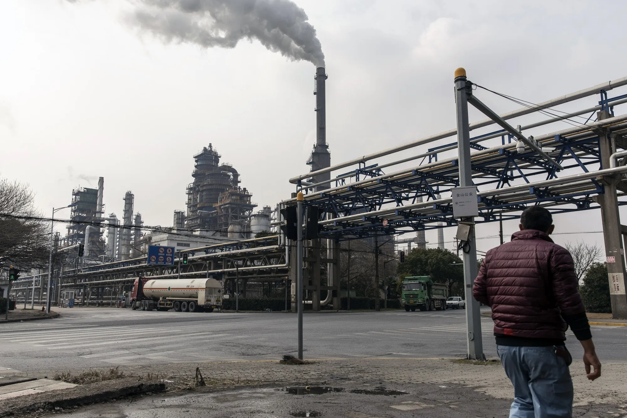 Smoke rises from a petrochemical production complex on the outskirts of Shanghai, China.