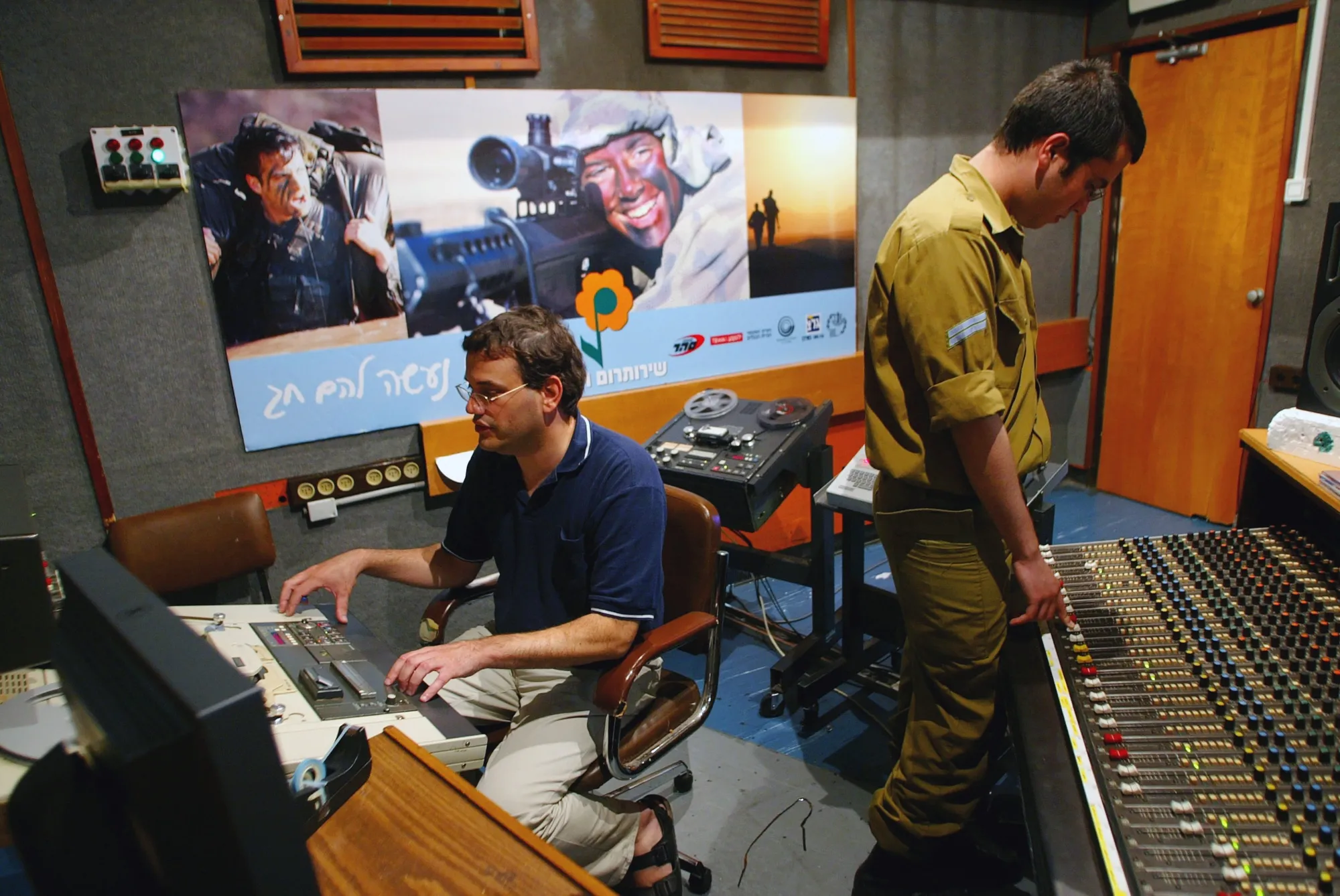 Station employees work&nbsp;in the studio of the Israel Army Radio station&nbsp;in Tel Aviv in 2002.