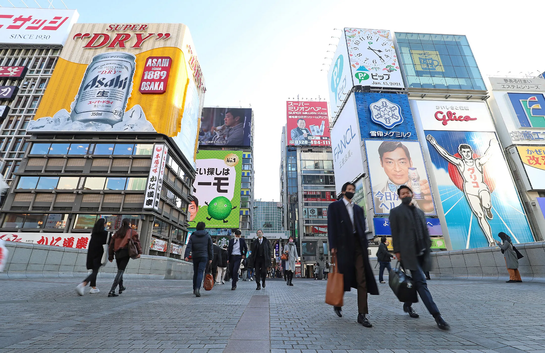 People in downtown Osaka earlier in January.