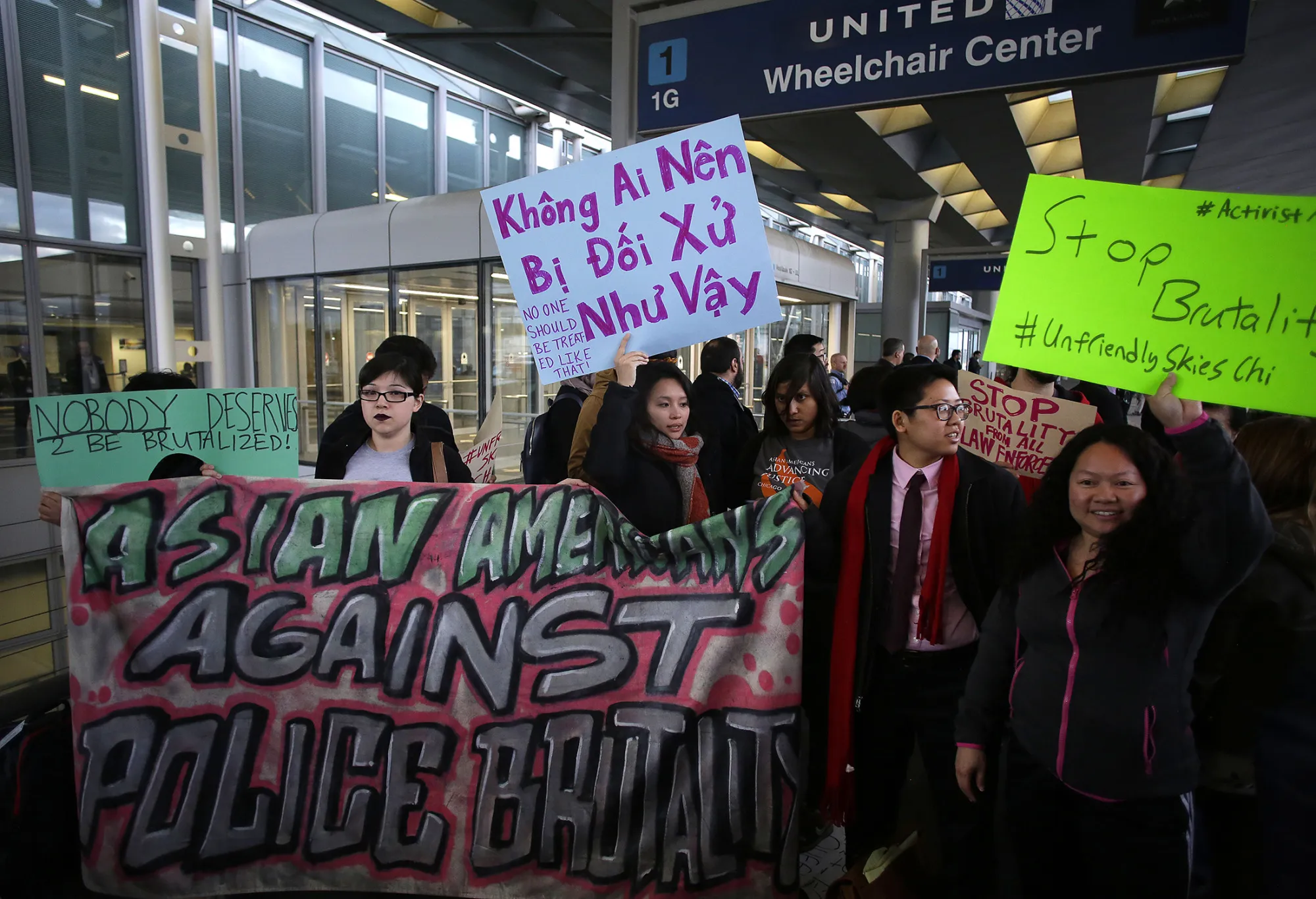 Demonstrators protest United Airlines at O'Hare International Airport in Chicago on April 11, 2017.
