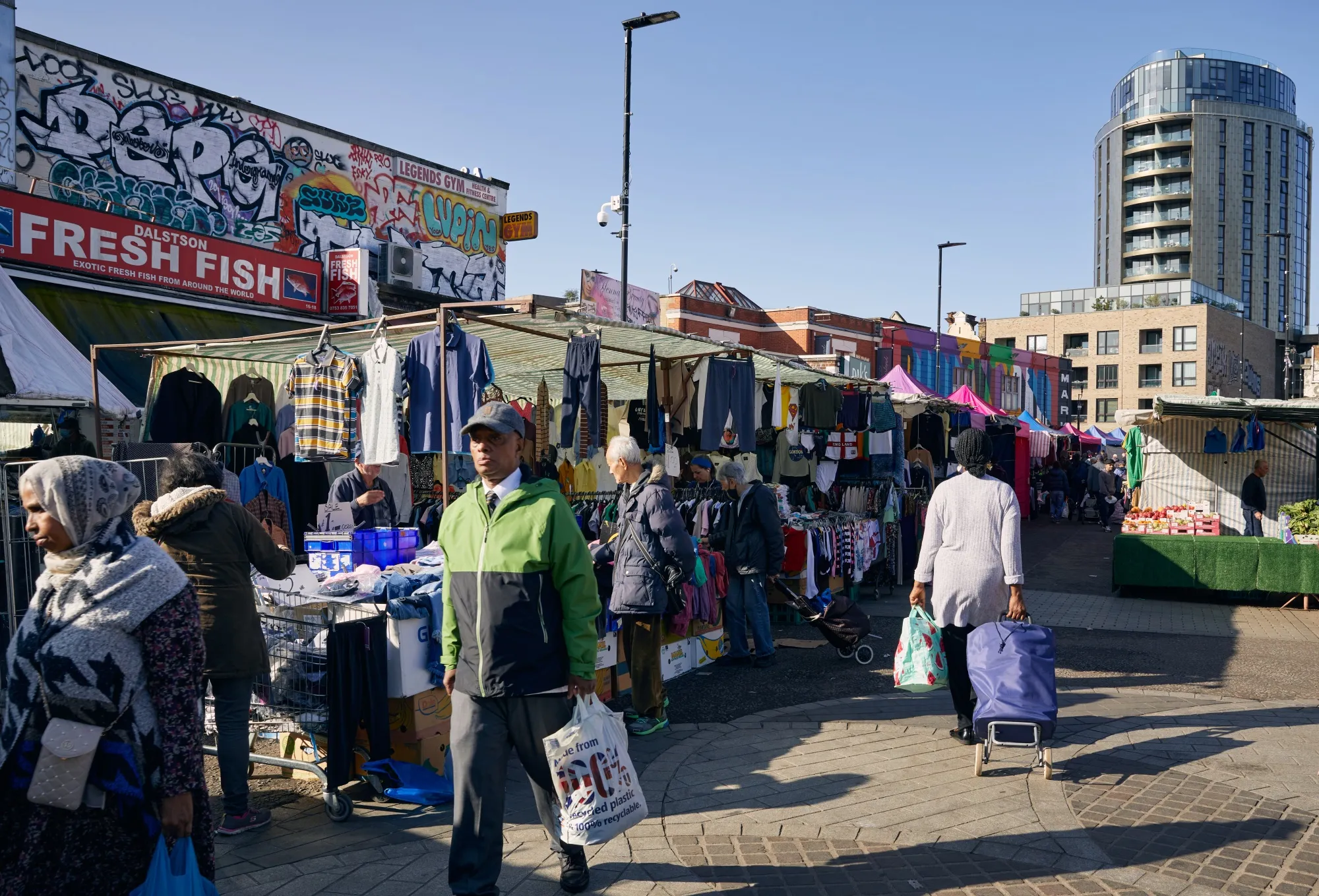 Shoppers at Ridley Road Market in the Hackney borough of London, UK.
