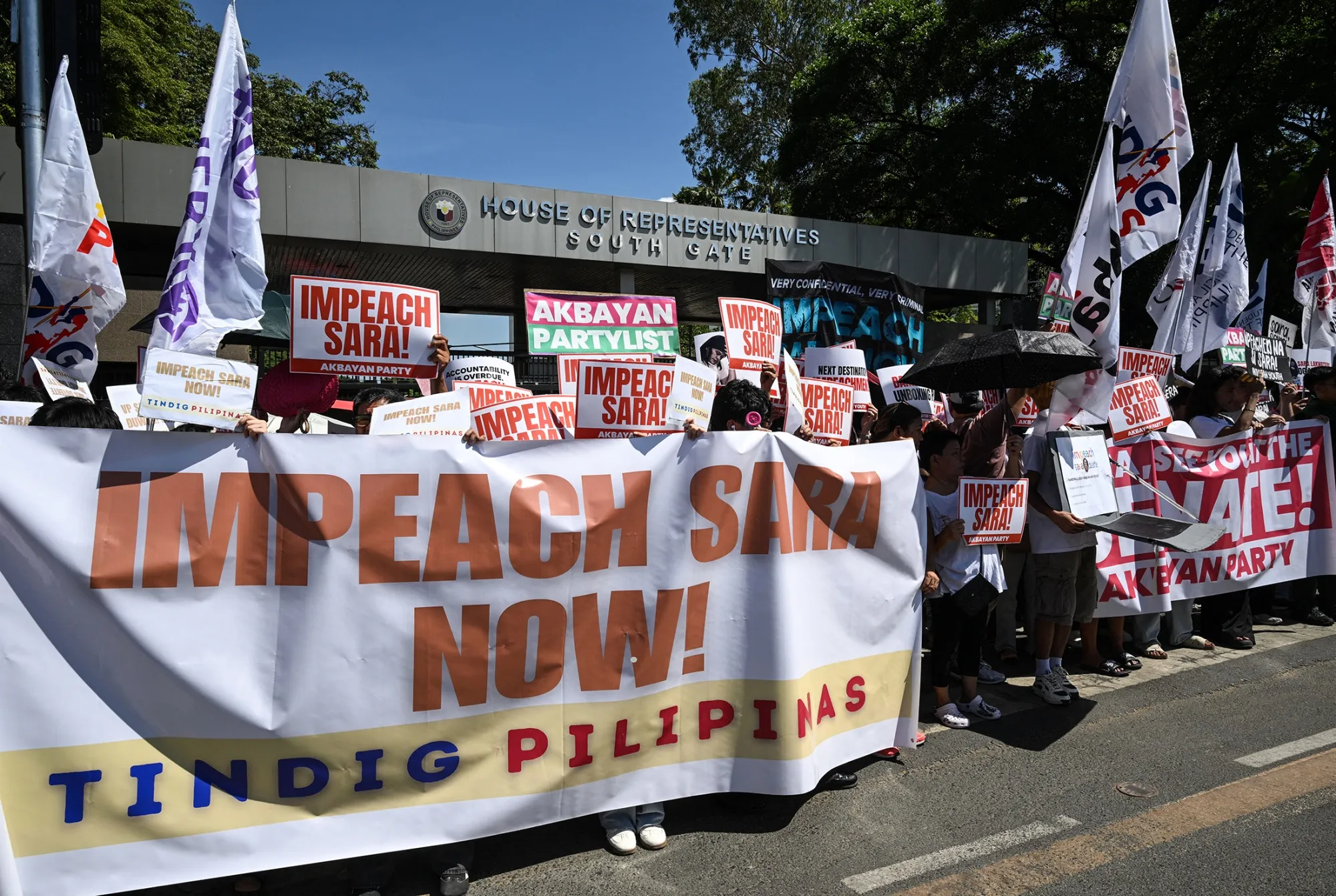 Protesters in support of the impeachment of Sara Duterte outside the House of Representatives in Quezon City, Metro Manila on May 11.