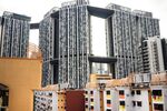 The Pinnacle@Duxton stands behind Everton Park residential apartment blocks, both HDB public housing estates, in Singapore.