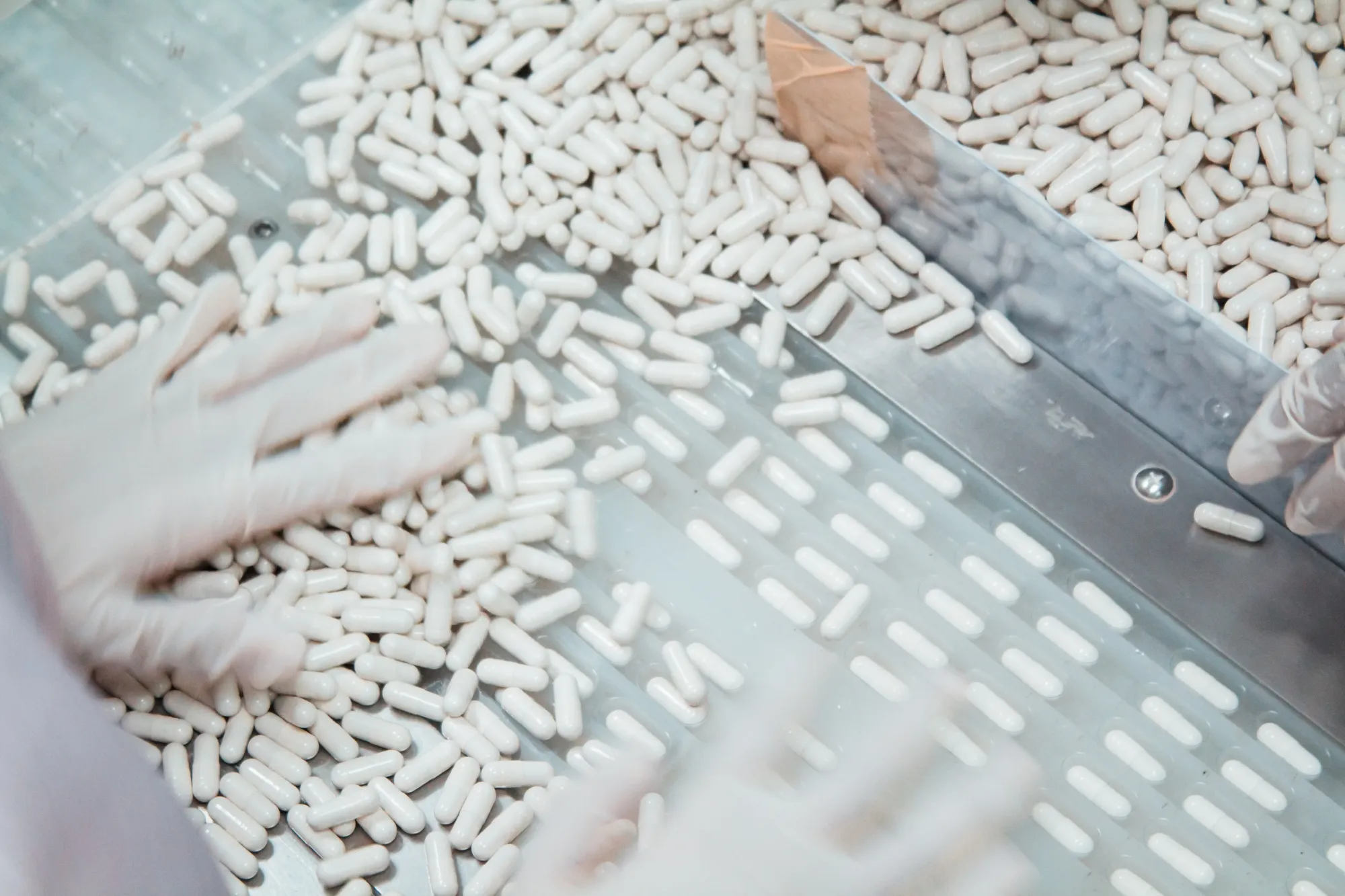 Capsule production process in a factory.