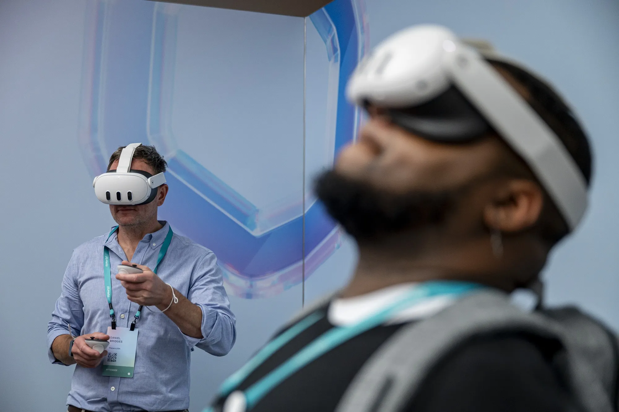 Attendees use Meta Platforms Inc. Quest 3 virtual reality headsets during the Meta Connect event in Menlo Park, California.