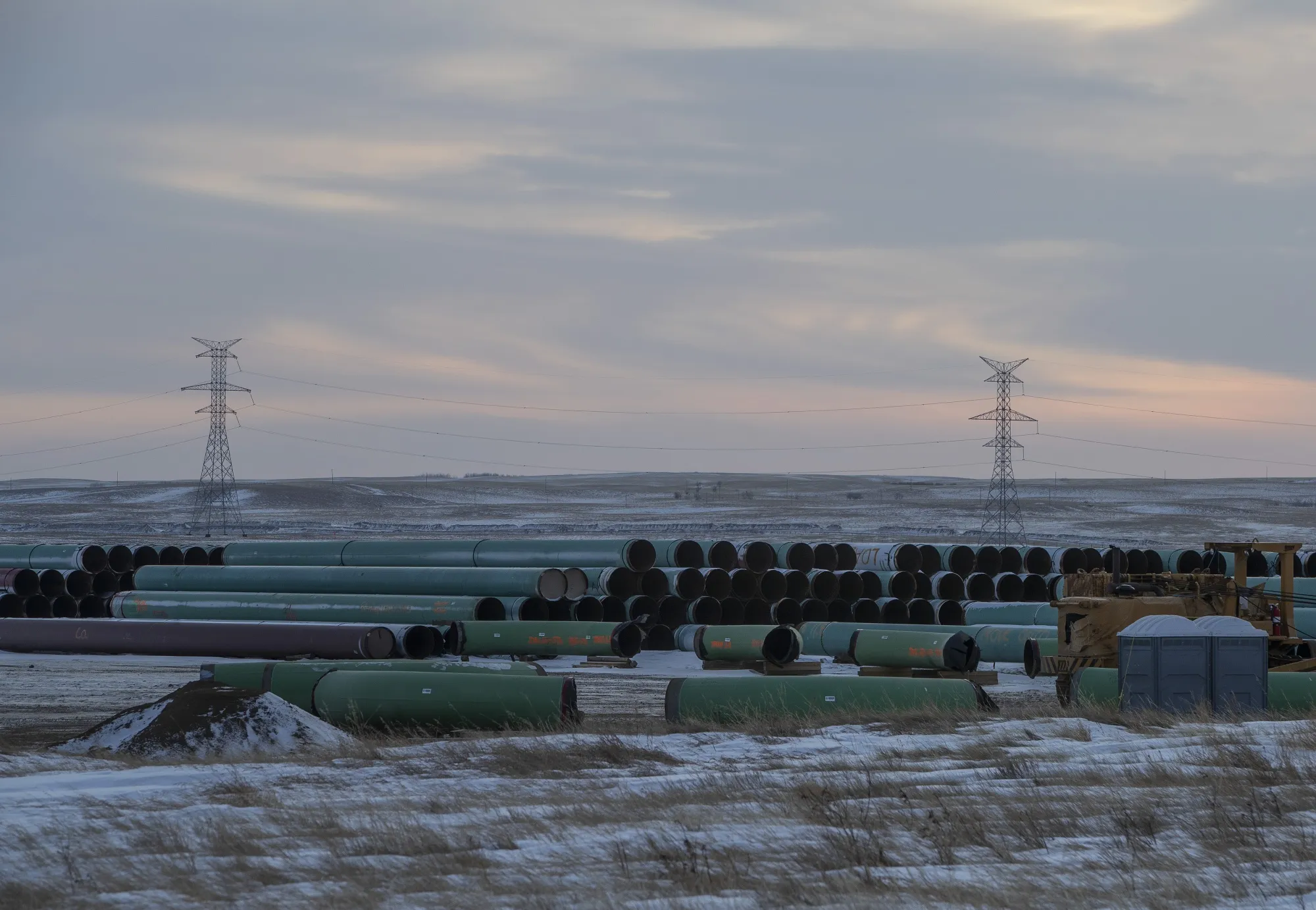 Pipes for the Keystone XL pipeline stacked in a yard near Oyen, Alberta, Canada, in January.