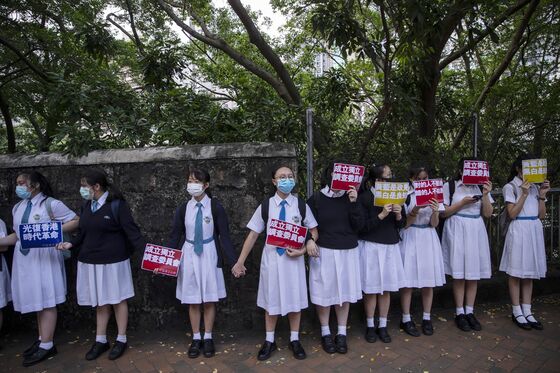 Hong Kong Financial Elites Shun Local Schools as Protests Mount