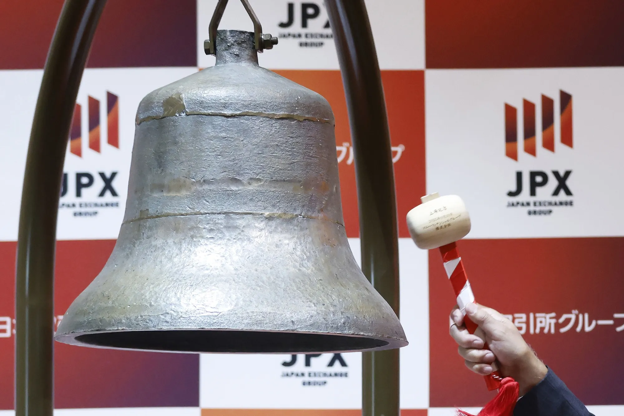 Ringing of the trading bell during a listing ceremony at the Tokyo Stock Exchange in Tokyo.