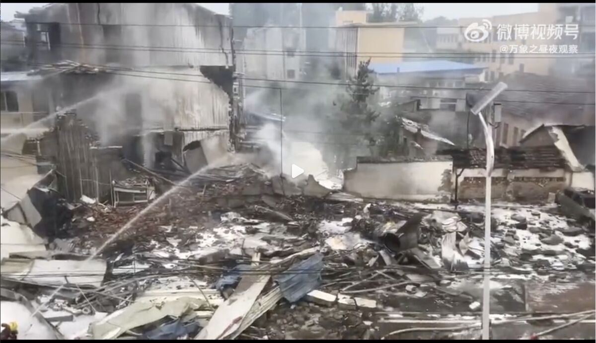 China S Military J 7 Fighter Jet Crashes Into Houses And Explodes Killing One Bloomberg