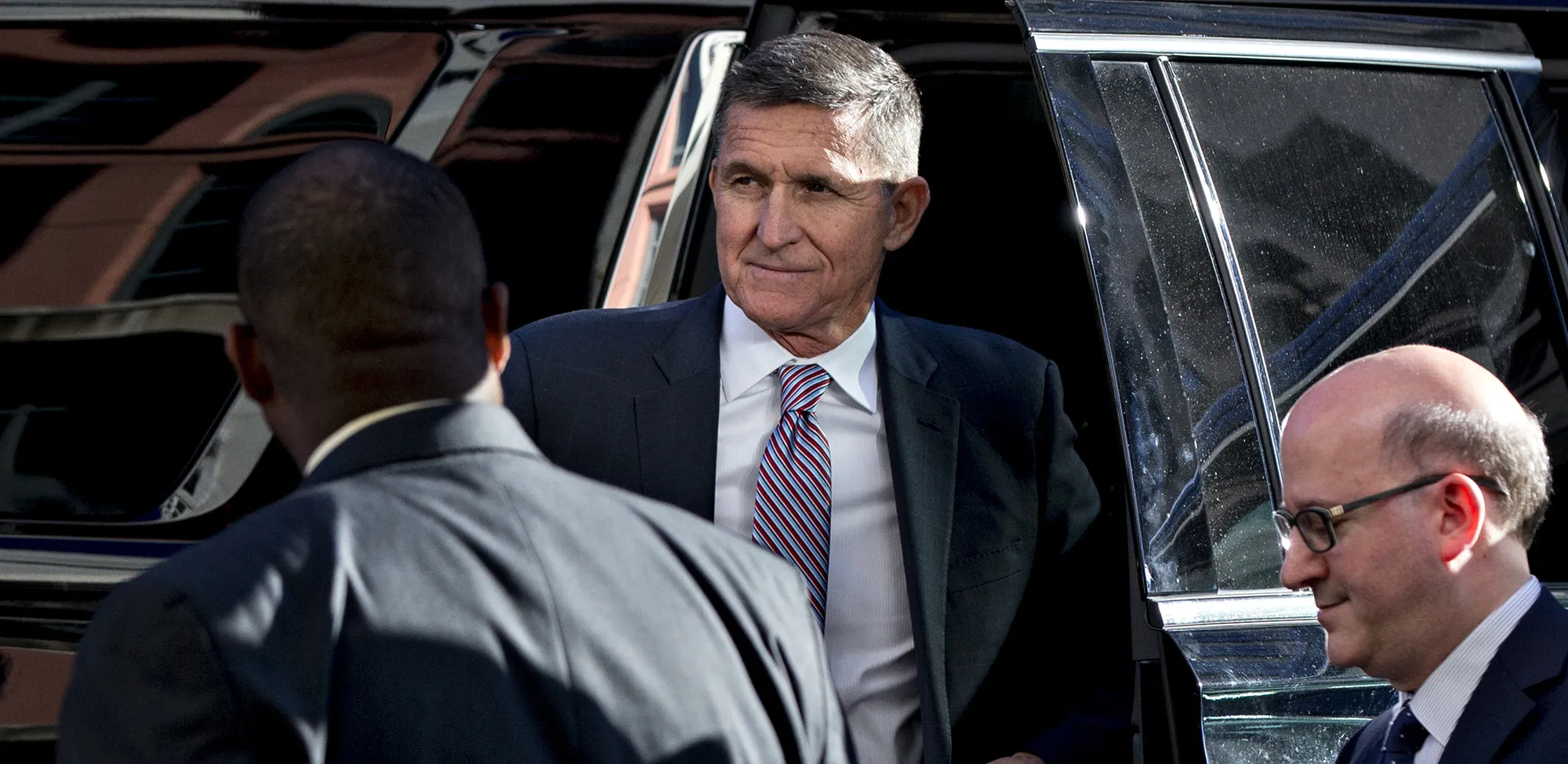 Michael Flynn, center, arrives at federal court in Washington, D.C. in 2018.