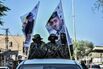 Masked fighters from Saraya al-Quds, the military wing of