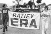 Chris Torracca and Kate McQueen lead Tuesday's (ERA) march. Published Press Herald 8/27/1980