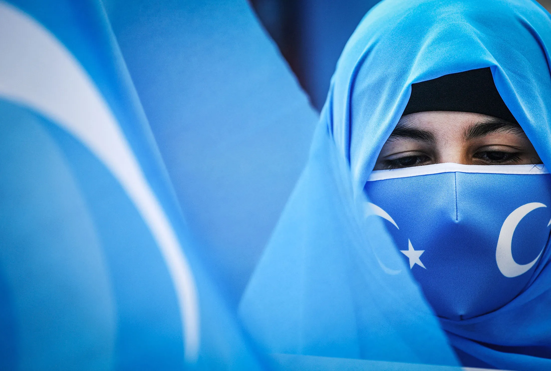TOPSHOT-TURKEY-CHINA-UYGHUR-WOMEN-DAY-DEMO