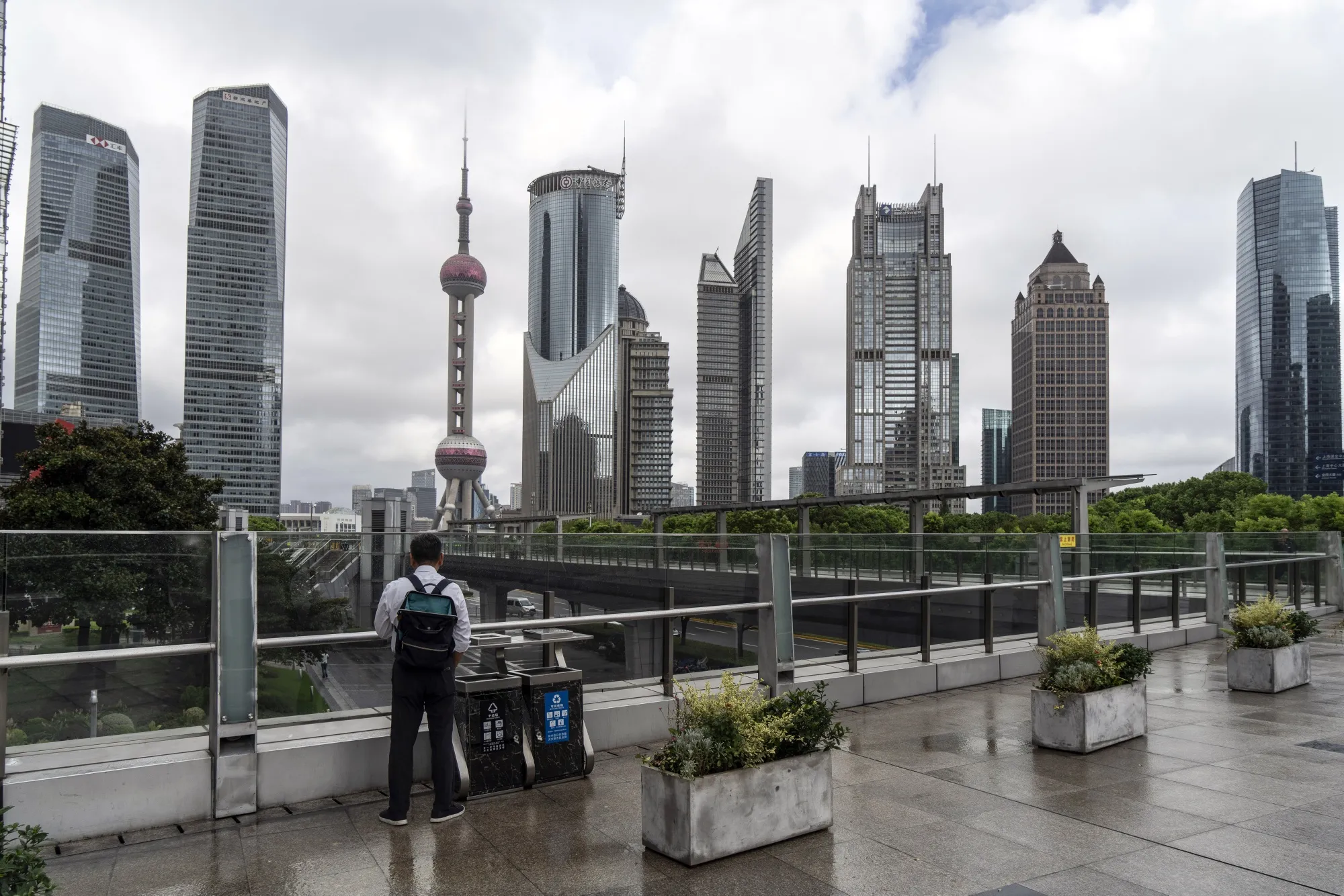 An office worker takes a break to smoke&nbsp;a cigarette in Shanghai.