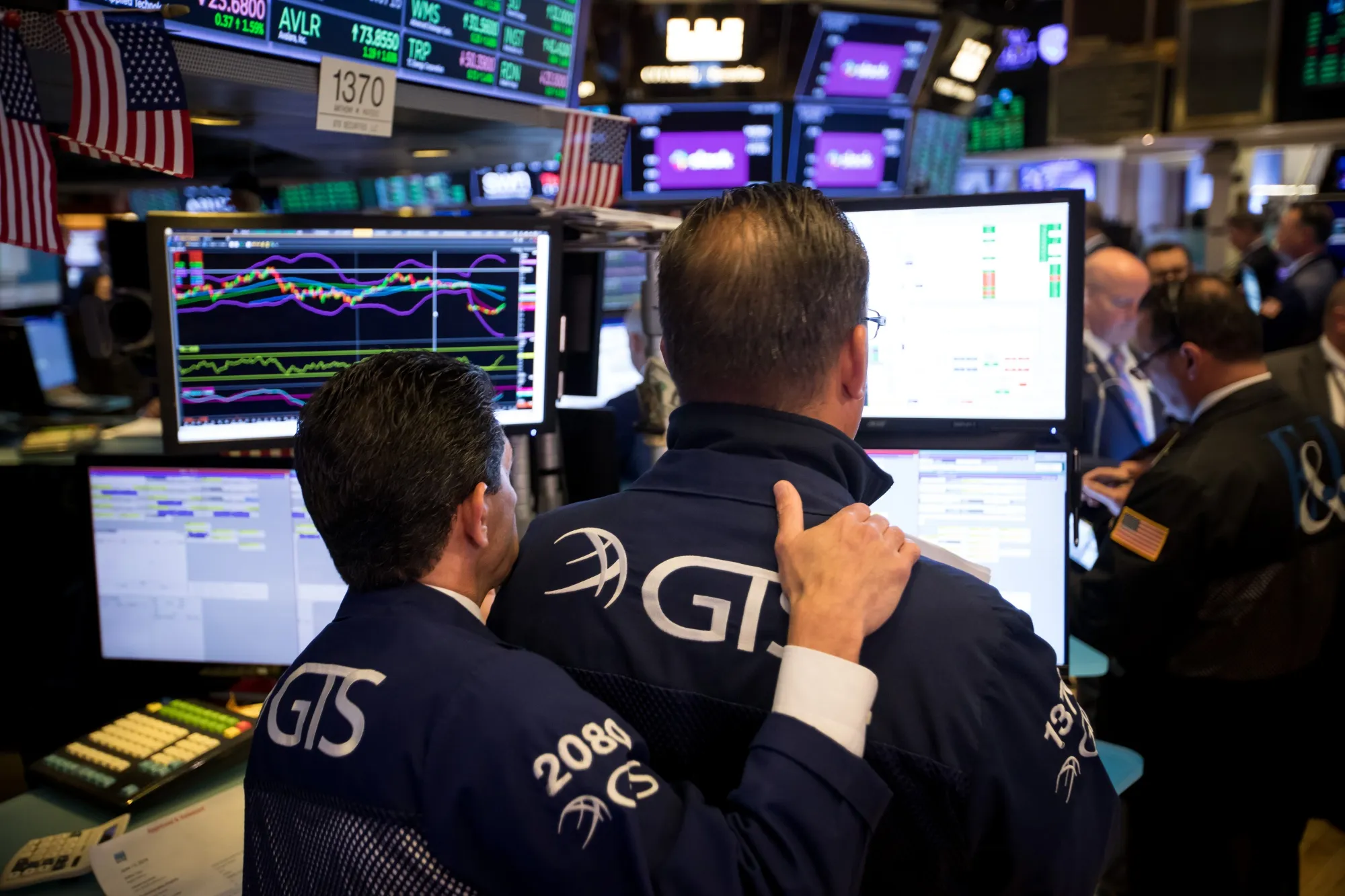 Traders work on the floor of the New York Stock Exchange.