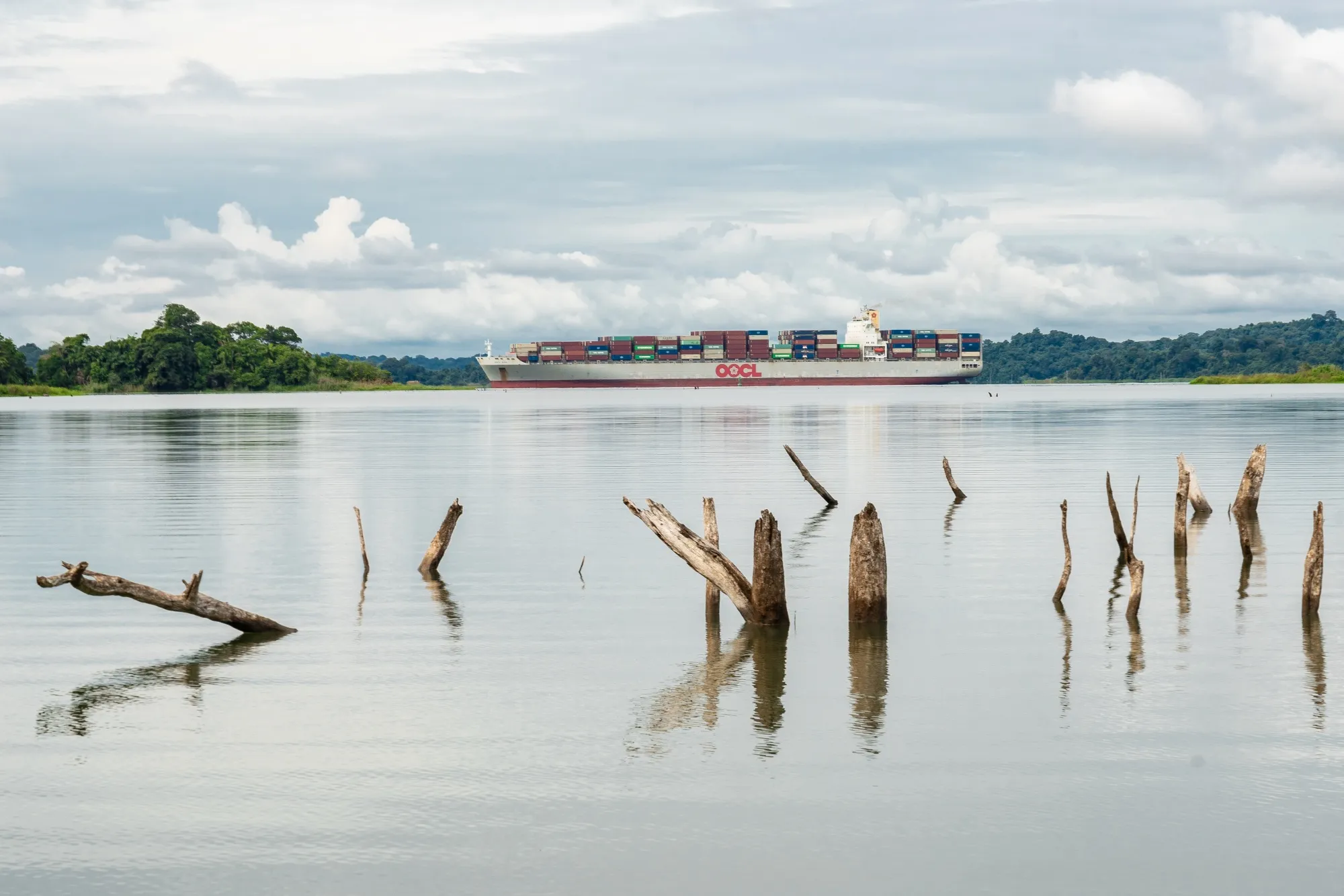 A container vessel navigates low water levls at Gatun Lake in Colon, Panama on Nov. 20, 2023.