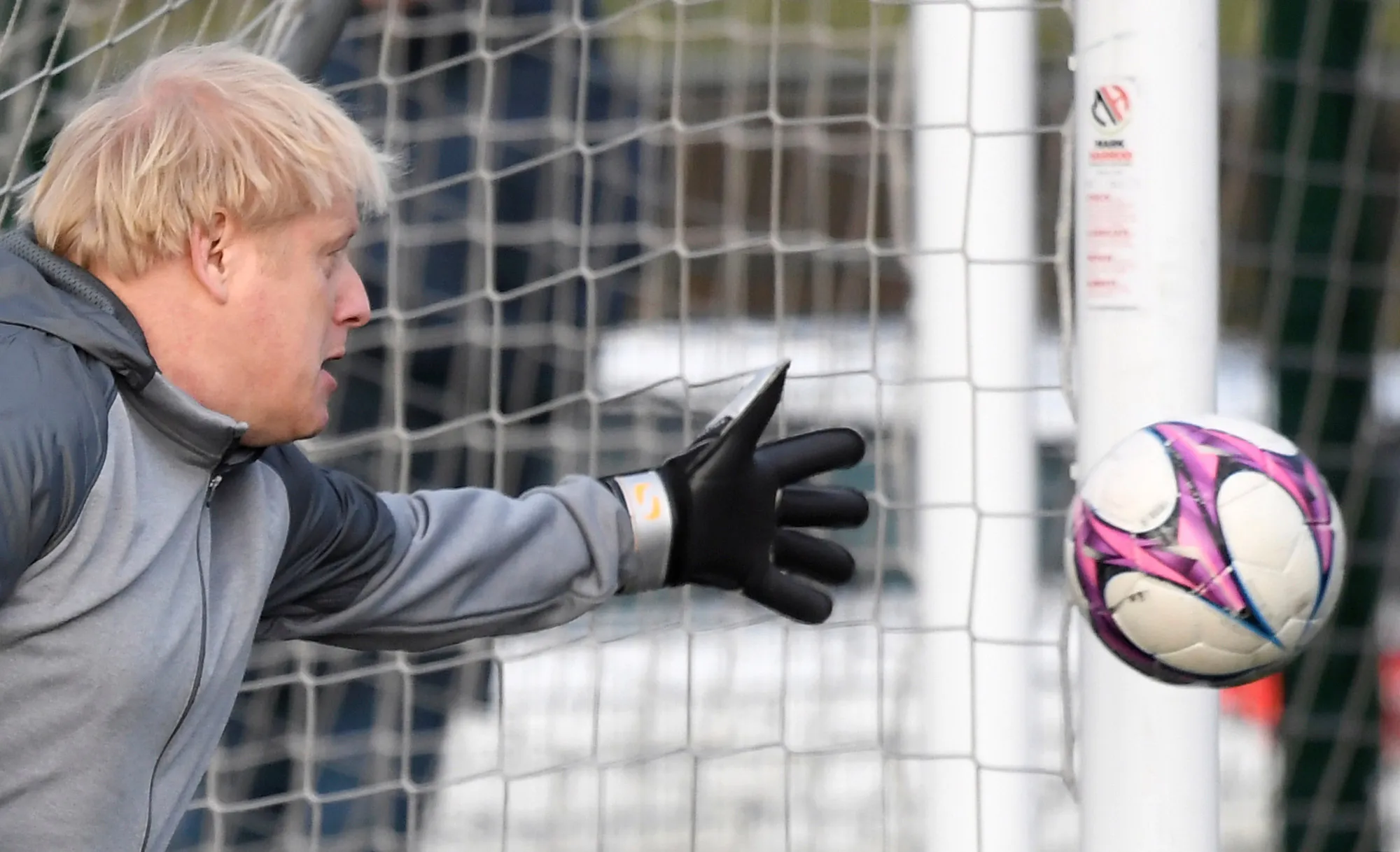 Boris Johnson tries to save a shot during a warm up before a girls football match while on the campaign trail in Cheadle Hulme, Dec.&nbsp;7.&nbsp;
