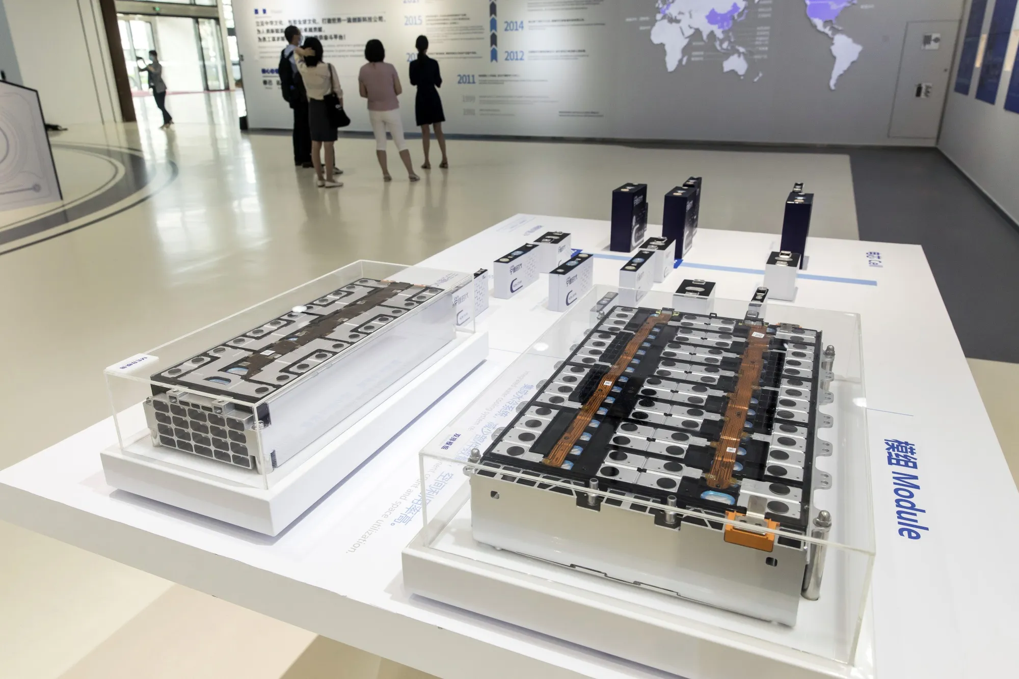 Cross-sections of electric vehicle batteries are displayed in the welcome center at the Contemporary Amperex Technology Co. headquarters building in Ningde, Fujian province, China.