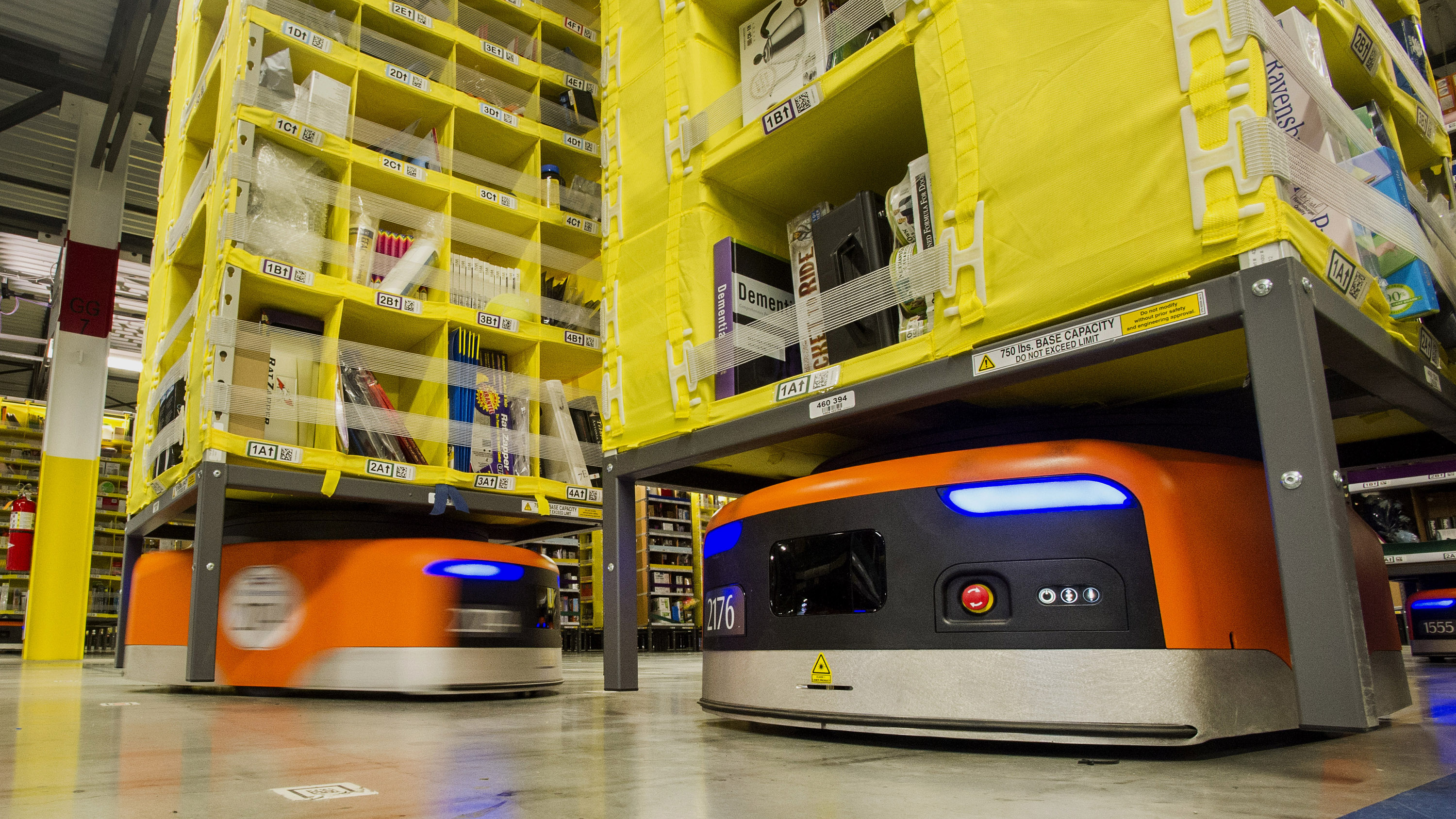 Kiva Systems robots working for Amazon. Photographer: David Paul Morris/Bloomberg
