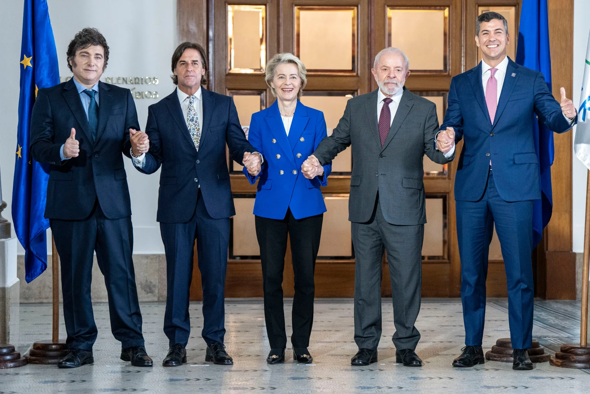 From left, Javier Milei, Luis Lacalle Pou, Ursula von der Leyen, Luiz Inacio Lula da Silva, and Santiago Pena, during the Mercosur Leaders Summit in Montevideo, Uruguay, on Dec. 6.