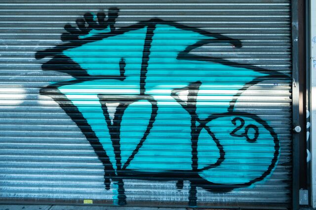 Abstract shape with crown and the number 20 at 1441 Myrtle Avenue, Brooklyn