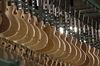 Guitars move along a conveyor system at the Gibson factory in Nashville.