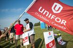 Employees and Unifor members demonstrate outside the General Motors Co. plant in Ingersoll, Ontario in September.